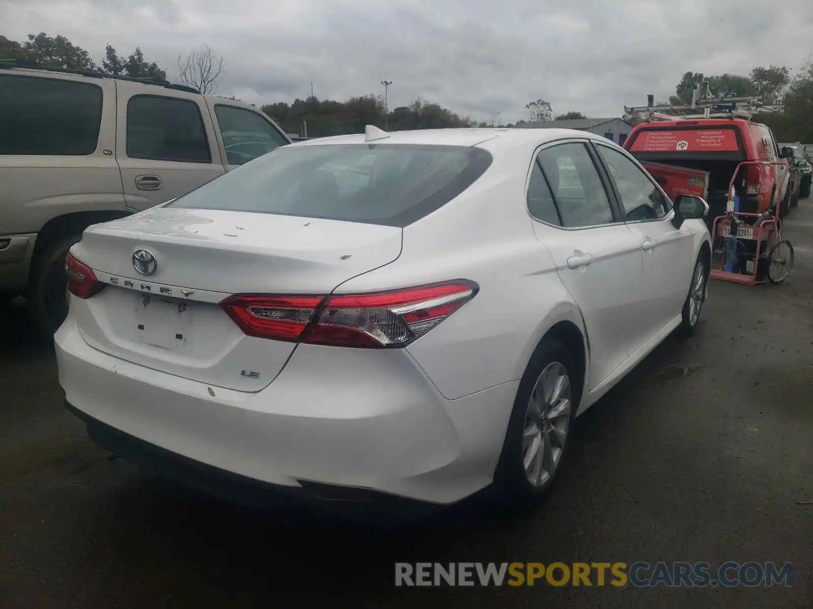 4 Photograph of a damaged car 4T1B11HK2KU266502 TOYOTA CAMRY 2019