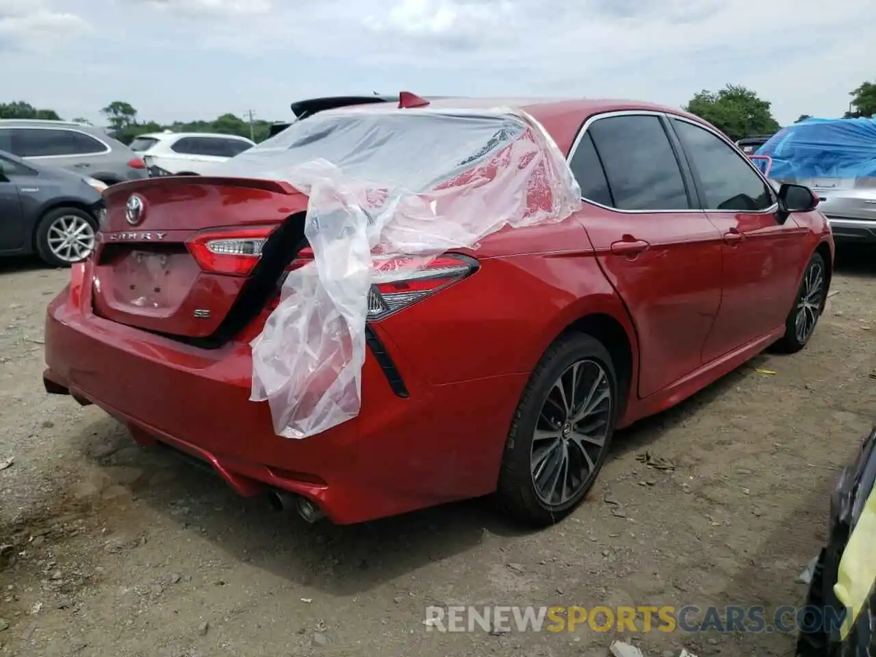 4 Photograph of a damaged car 4T1B11HK2KU267312 TOYOTA CAMRY 2019