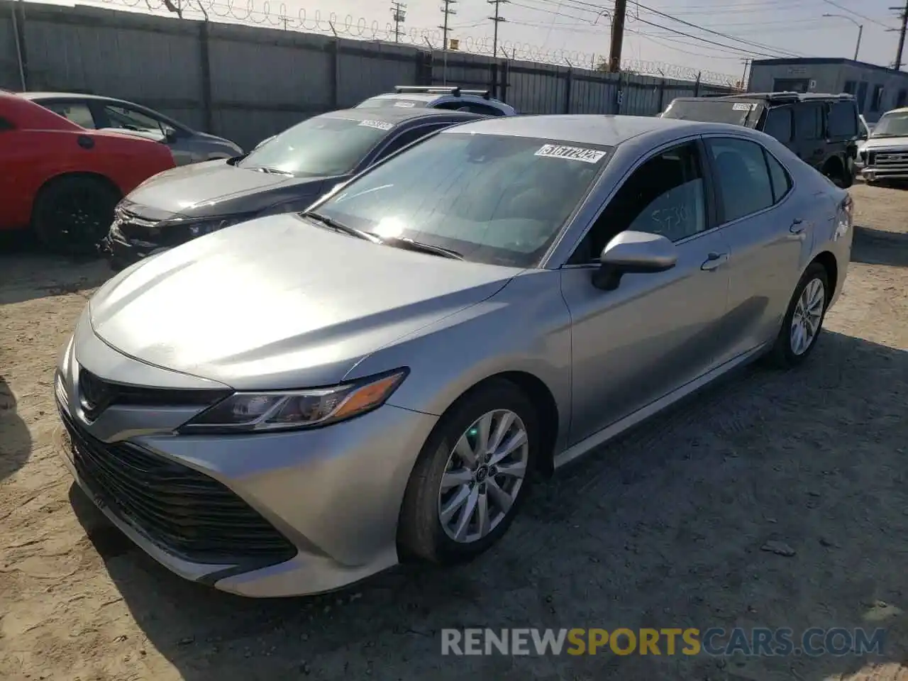 2 Photograph of a damaged car 4T1B11HK2KU269075 TOYOTA CAMRY 2019