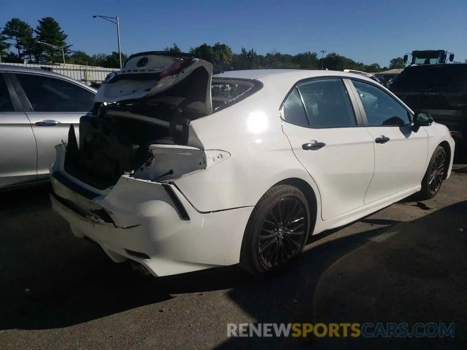 4 Photograph of a damaged car 4T1B11HK2KU270775 TOYOTA CAMRY 2019