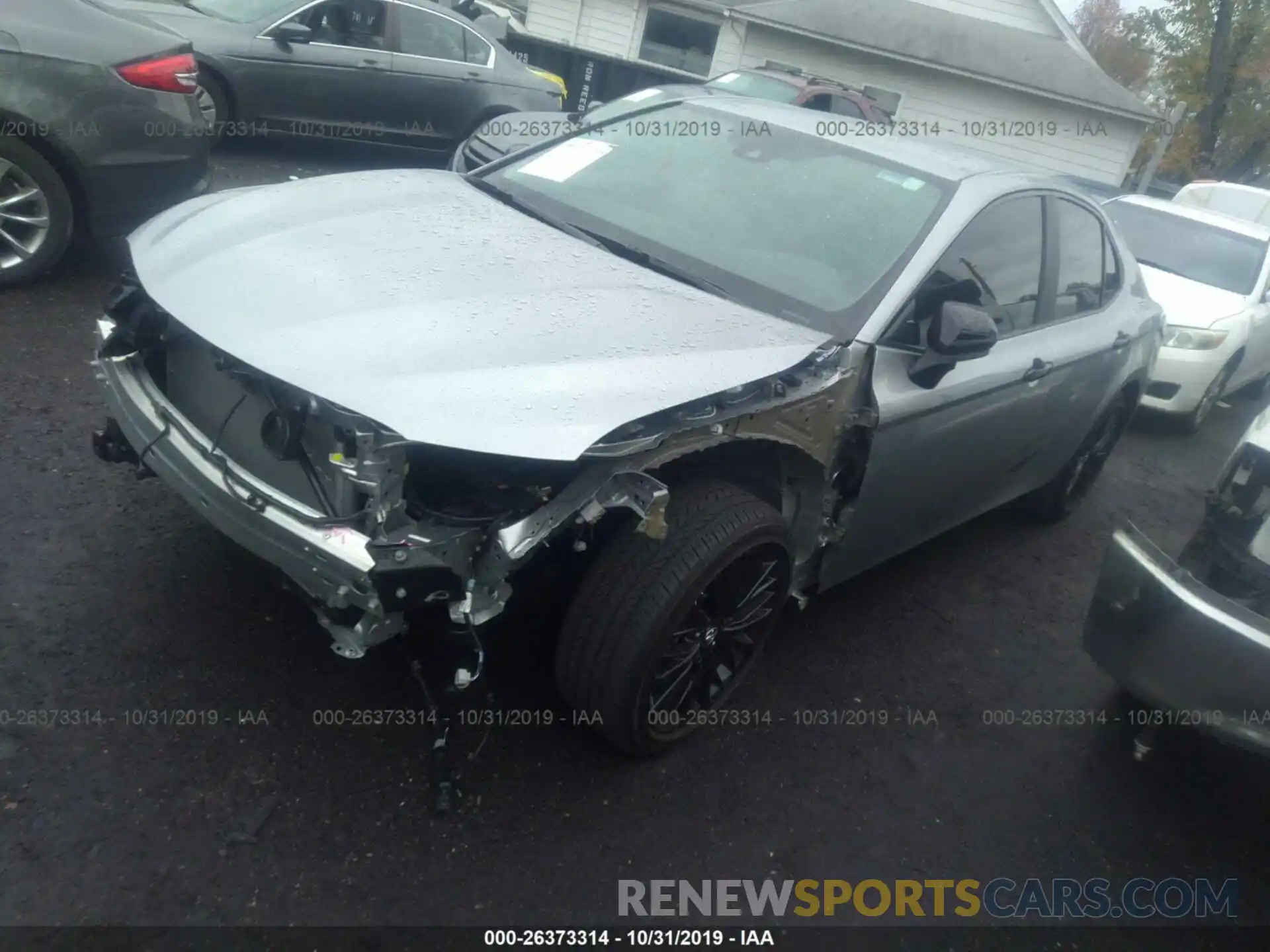 2 Photograph of a damaged car 4T1B11HK2KU272493 TOYOTA CAMRY 2019