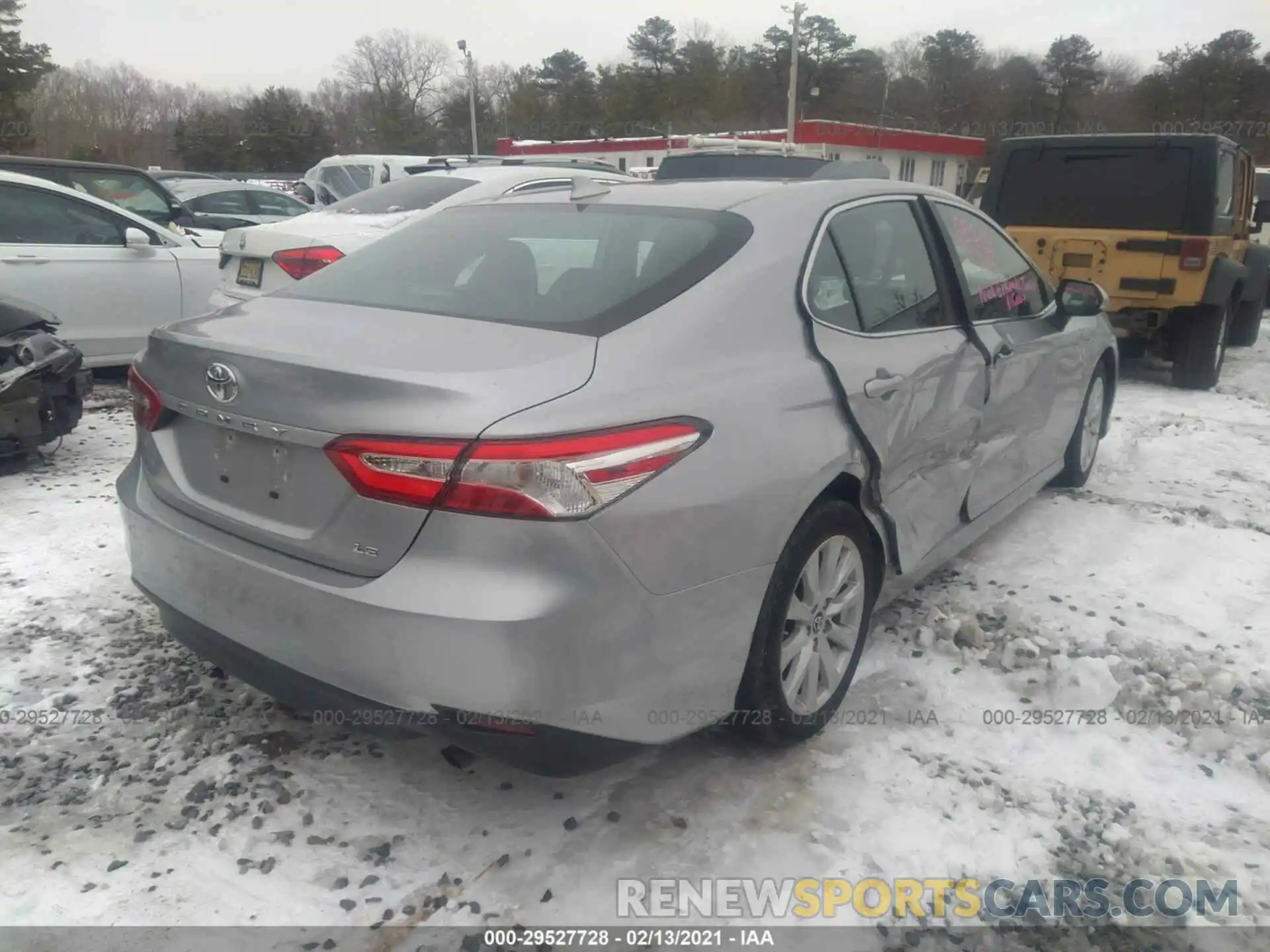 4 Photograph of a damaged car 4T1B11HK2KU274034 TOYOTA CAMRY 2019