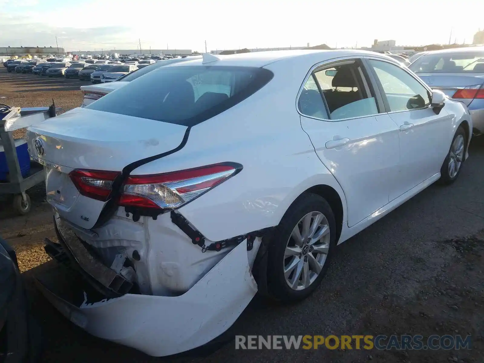 4 Photograph of a damaged car 4T1B11HK2KU286586 TOYOTA CAMRY 2019