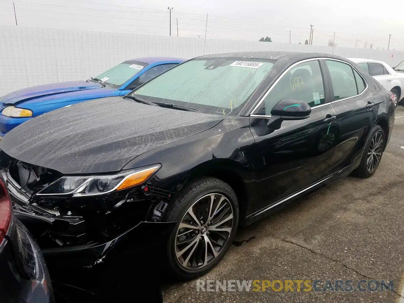 2 Photograph of a damaged car 4T1B11HK2KU293991 TOYOTA CAMRY 2019