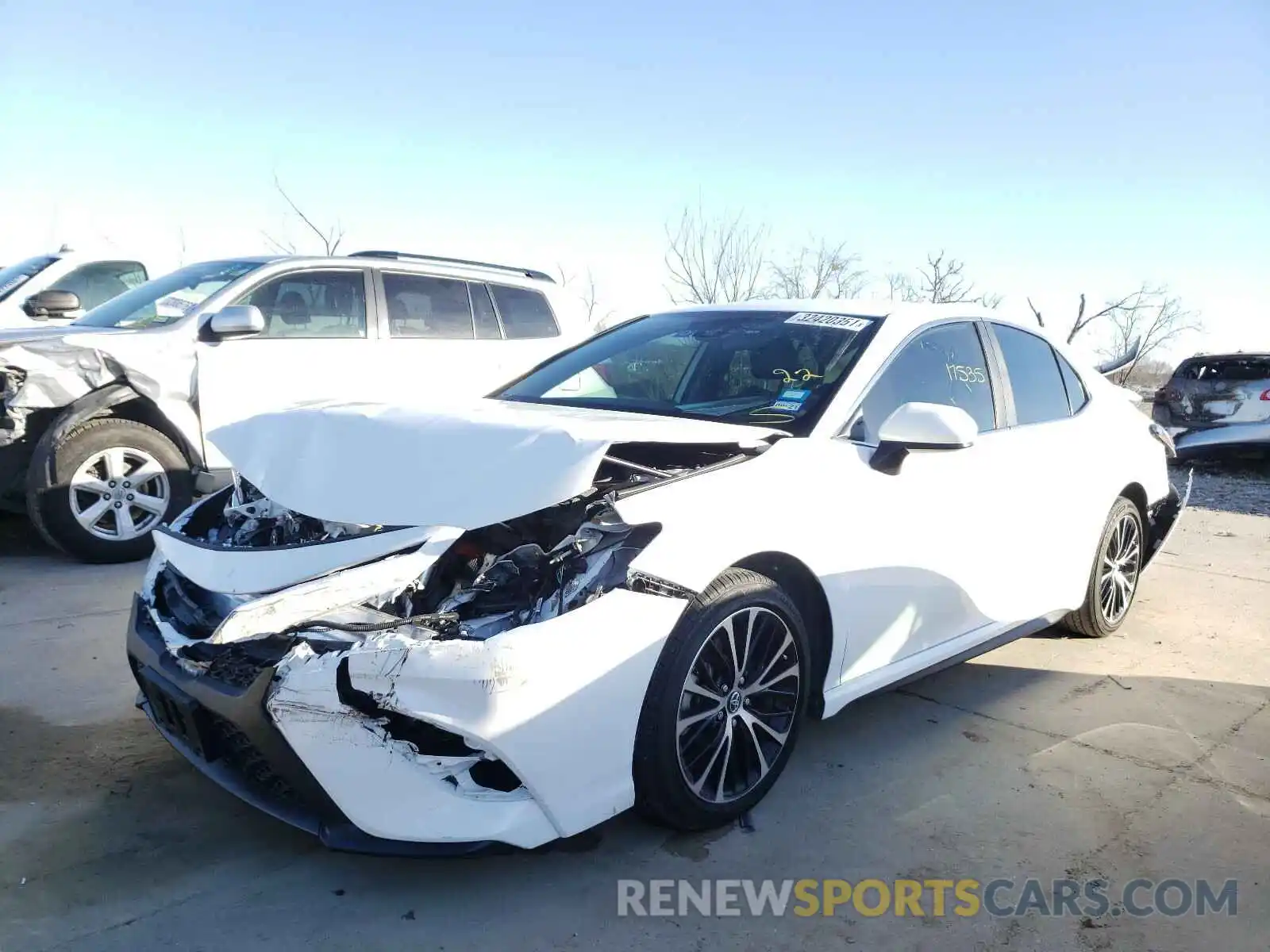 2 Photograph of a damaged car 4T1B11HK2KU299676 TOYOTA CAMRY 2019