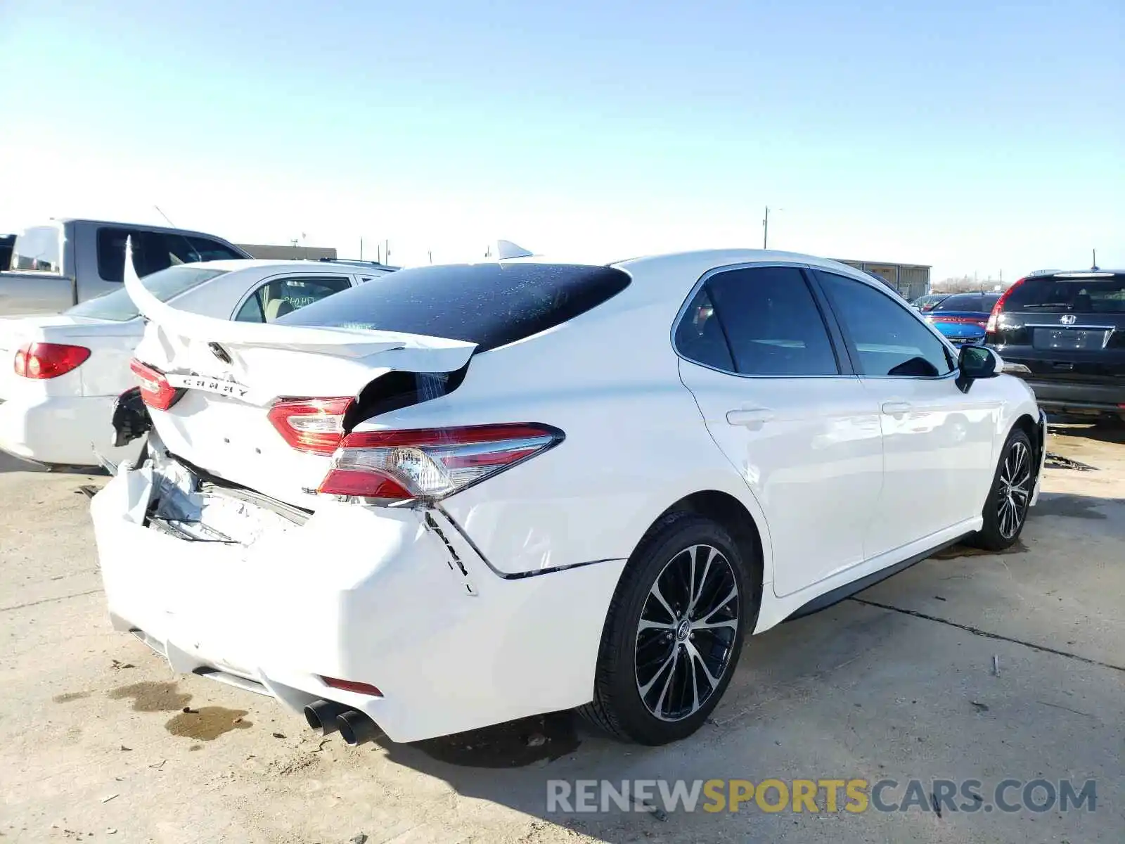 4 Photograph of a damaged car 4T1B11HK2KU299676 TOYOTA CAMRY 2019