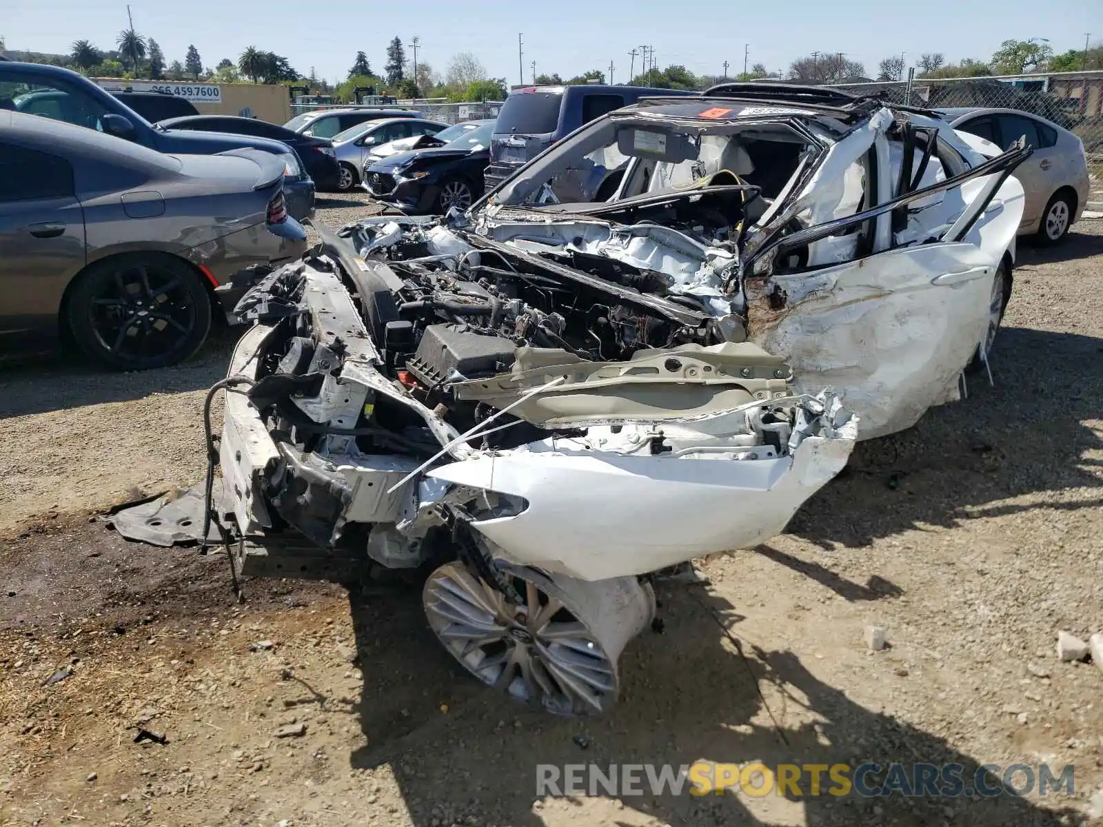 2 Photograph of a damaged car 4T1B11HK2KU679911 TOYOTA CAMRY 2019