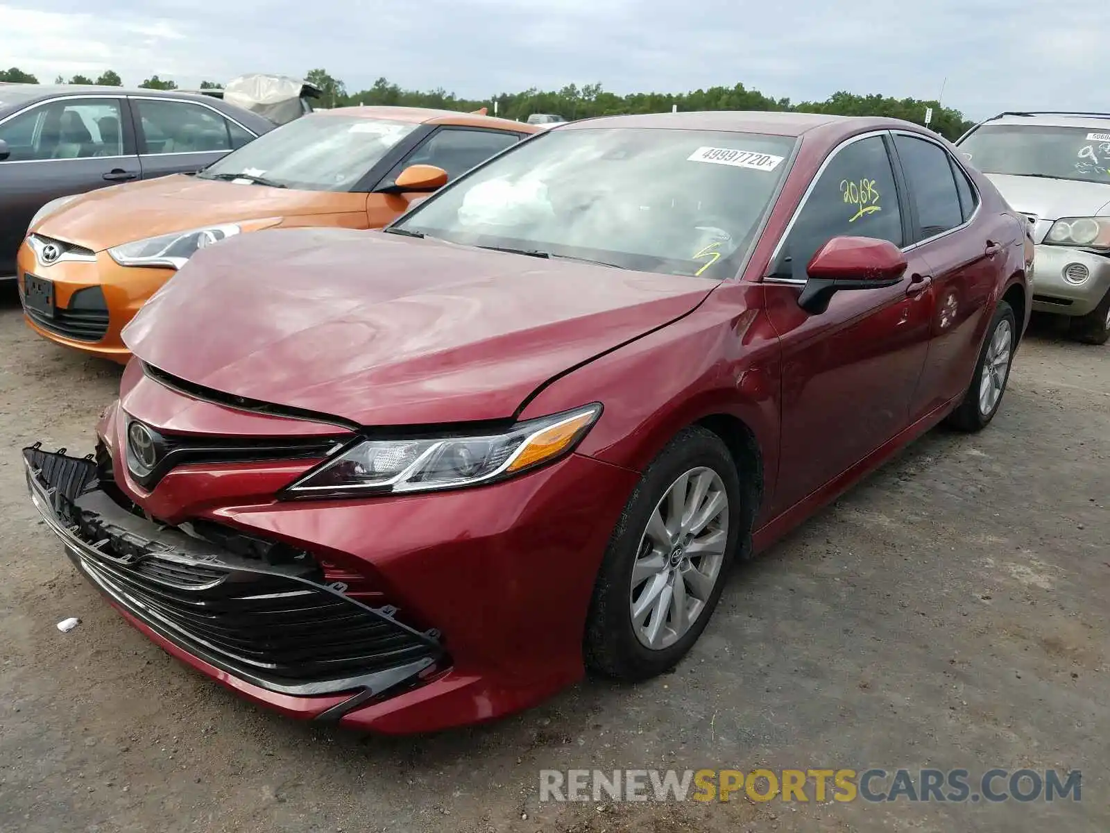 2 Photograph of a damaged car 4T1B11HK2KU683196 TOYOTA CAMRY 2019