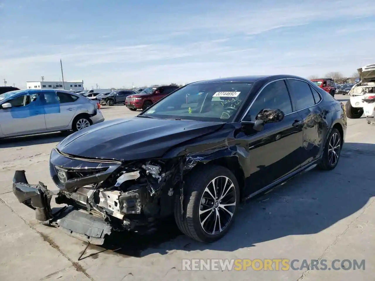 2 Photograph of a damaged car 4T1B11HK2KU683621 TOYOTA CAMRY 2019