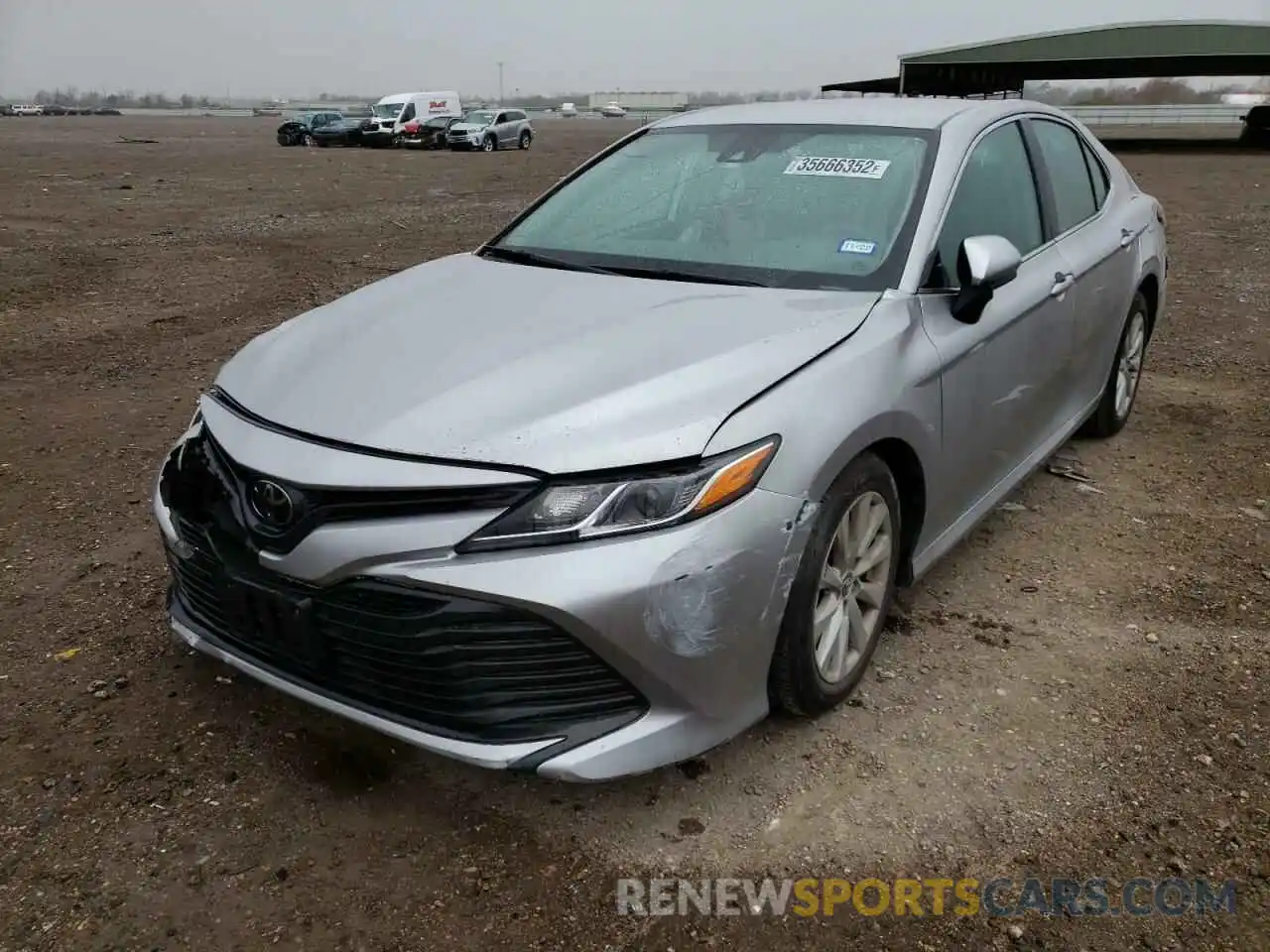 2 Photograph of a damaged car 4T1B11HK2KU684381 TOYOTA CAMRY 2019