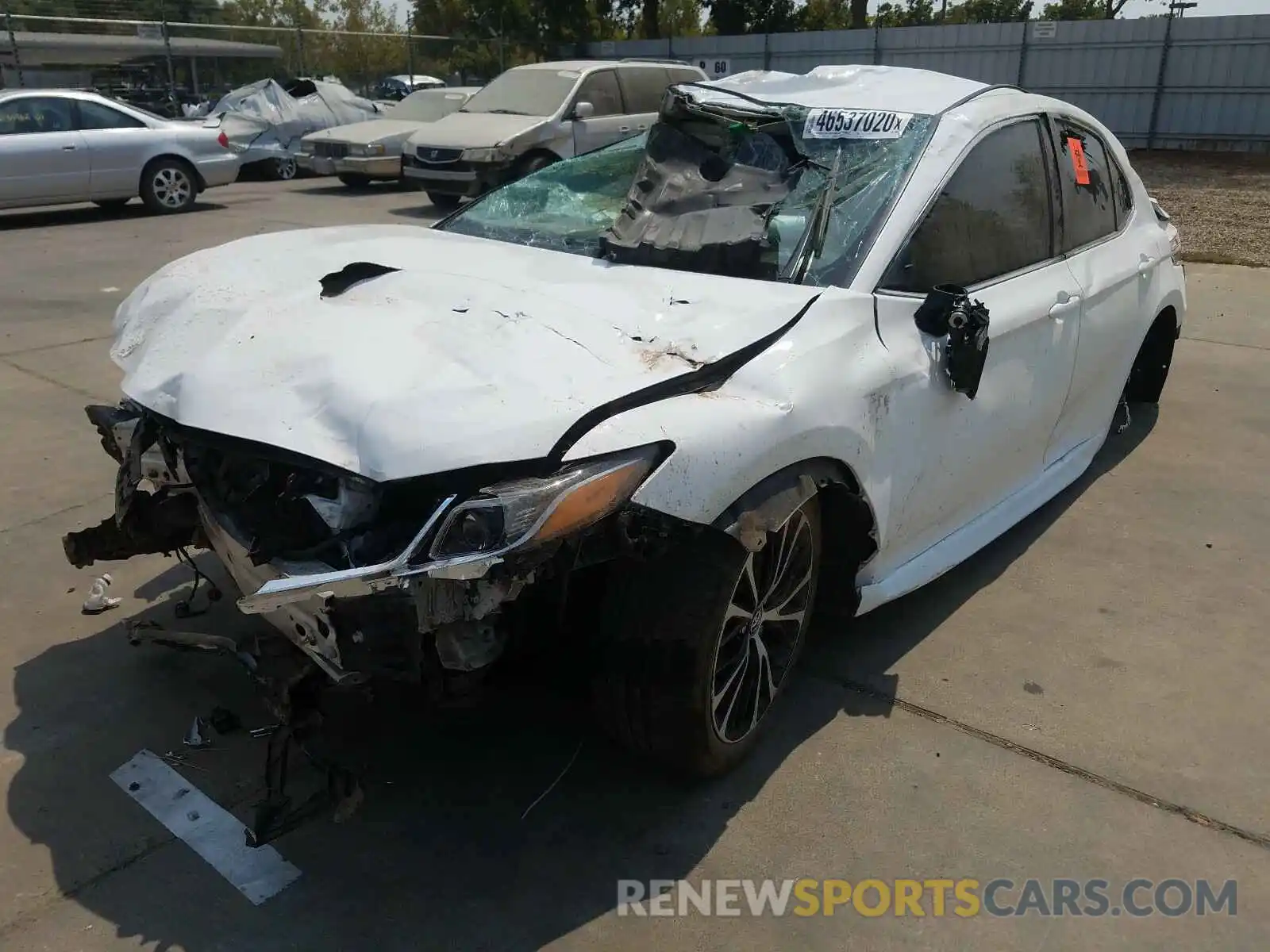 2 Photograph of a damaged car 4T1B11HK2KU690410 TOYOTA CAMRY 2019