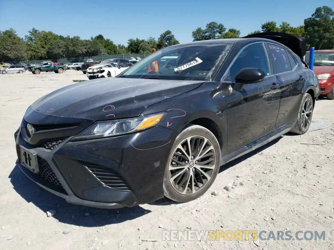 2 Photograph of a damaged car 4T1B11HK2KU690438 TOYOTA CAMRY 2019