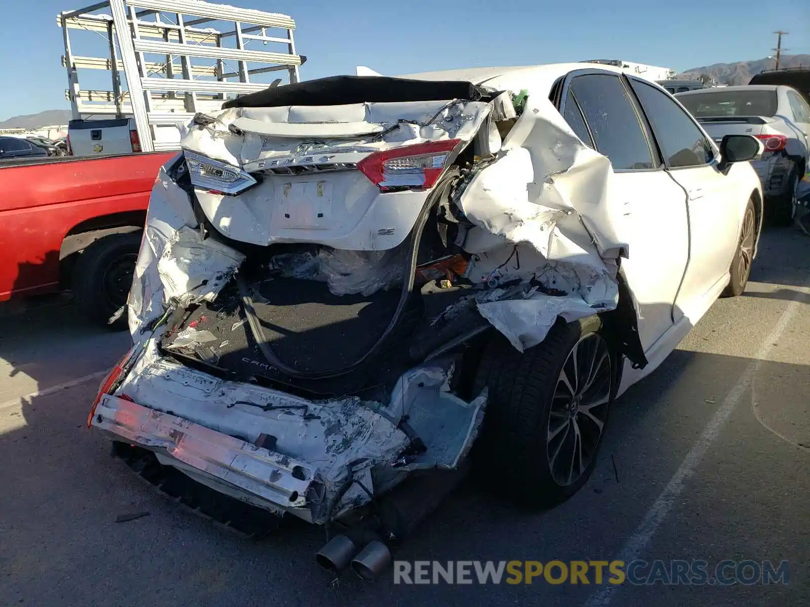 4 Photograph of a damaged car 4T1B11HK2KU691153 TOYOTA CAMRY 2019