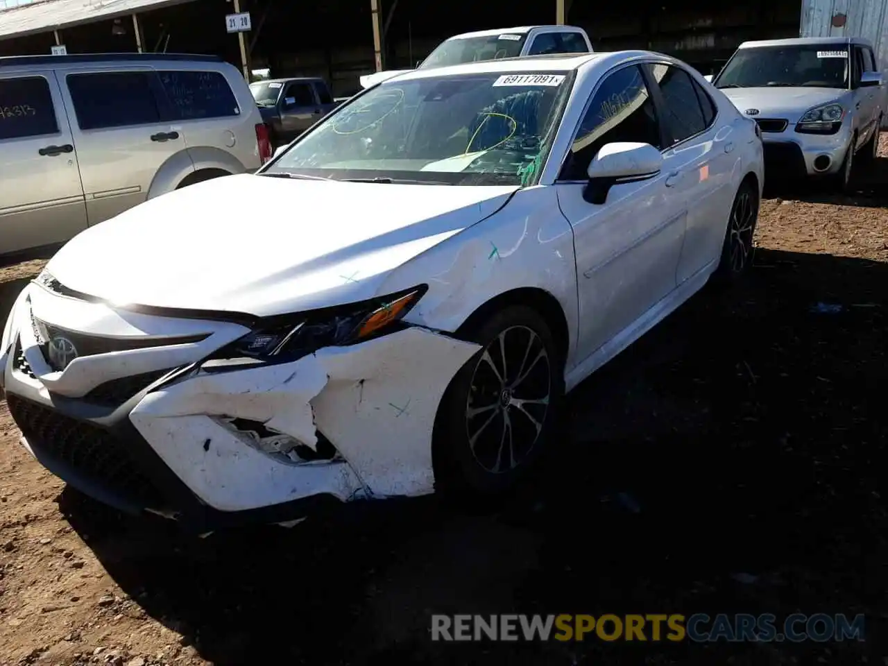 2 Photograph of a damaged car 4T1B11HK2KU693369 TOYOTA CAMRY 2019