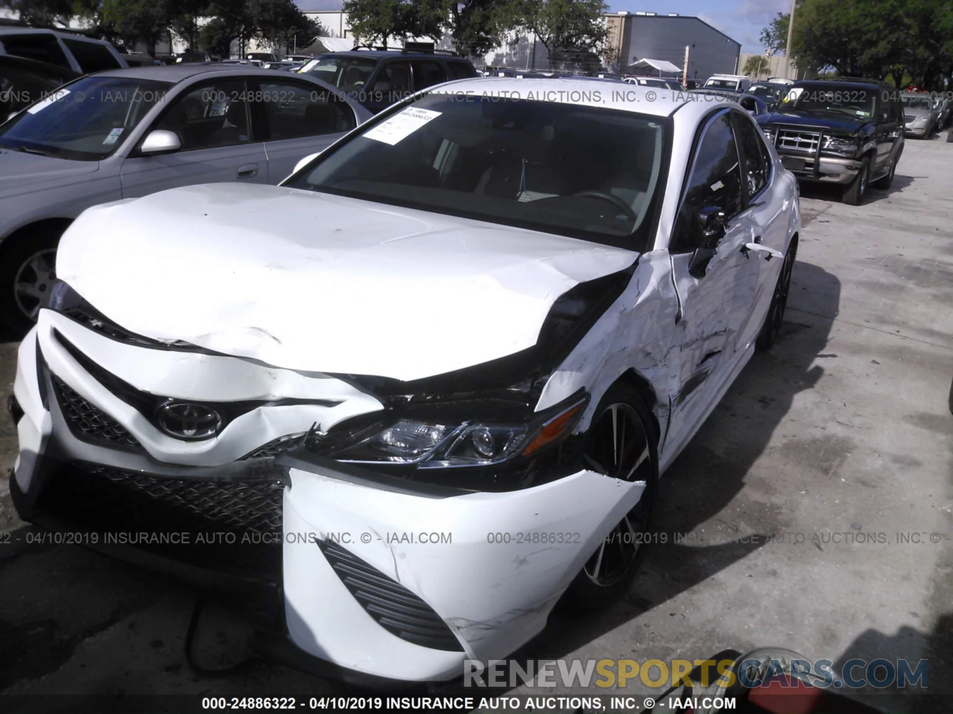 2 Photograph of a damaged car 4T1B11HK2KU694277 TOYOTA CAMRY 2019