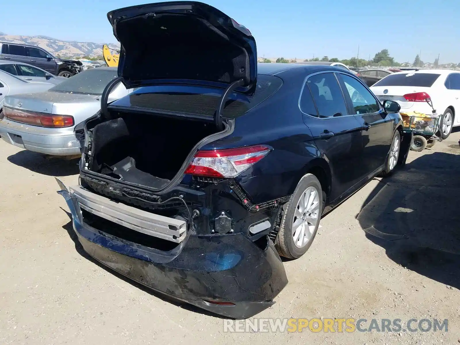 4 Photograph of a damaged car 4T1B11HK2KU697485 TOYOTA CAMRY 2019