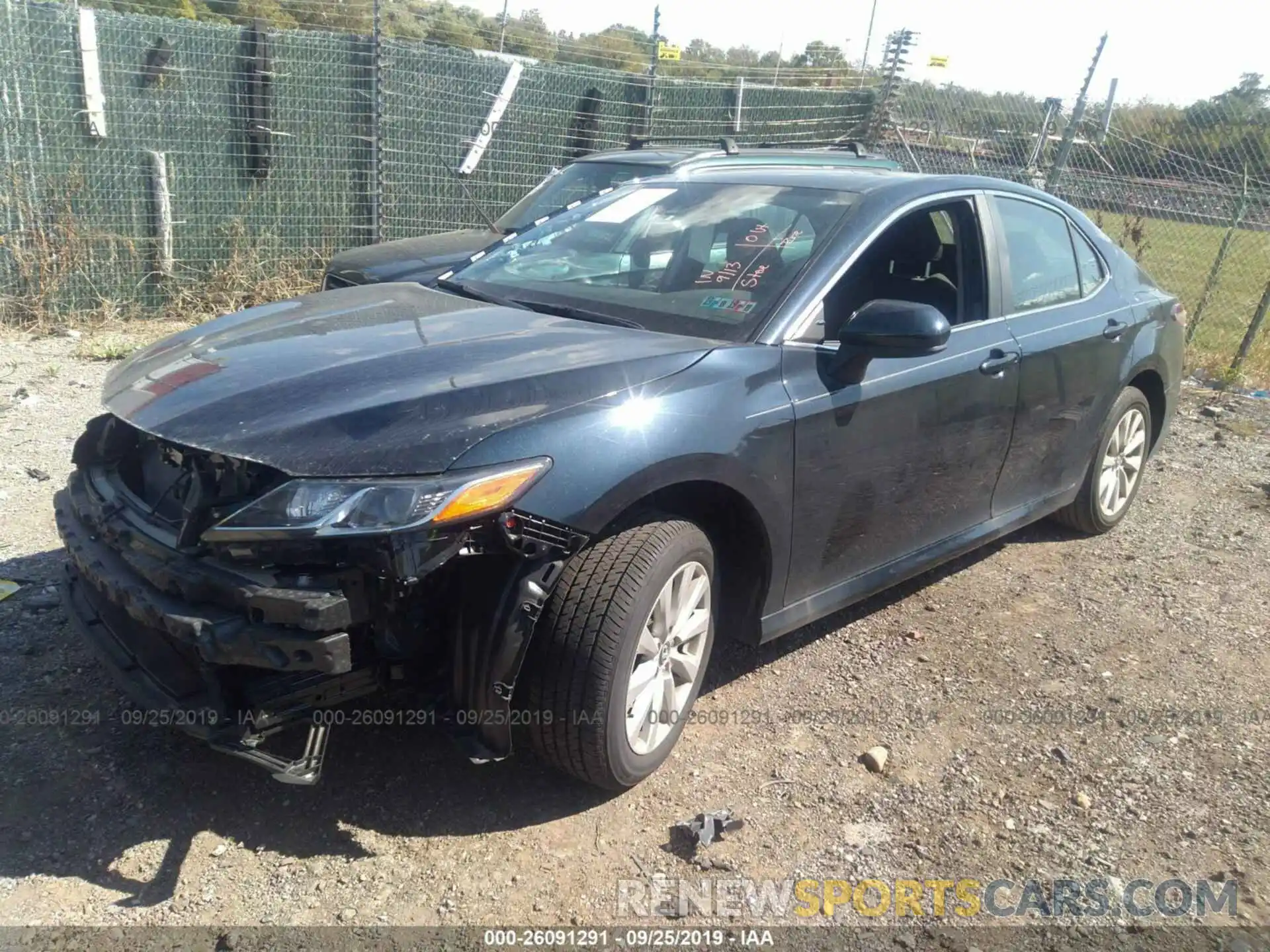 2 Photograph of a damaged car 4T1B11HK2KU697521 TOYOTA CAMRY 2019