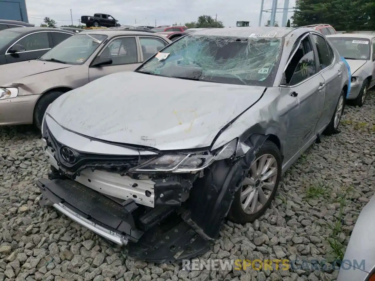 2 Photograph of a damaged car 4T1B11HK2KU700143 TOYOTA CAMRY 2019