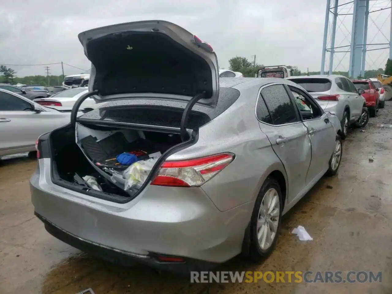 4 Photograph of a damaged car 4T1B11HK2KU700143 TOYOTA CAMRY 2019