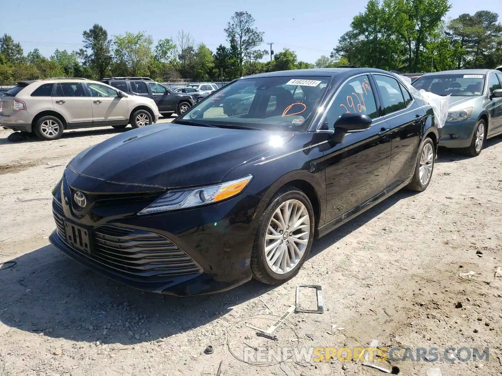 2 Photograph of a damaged car 4T1B11HK2KU700269 TOYOTA CAMRY 2019