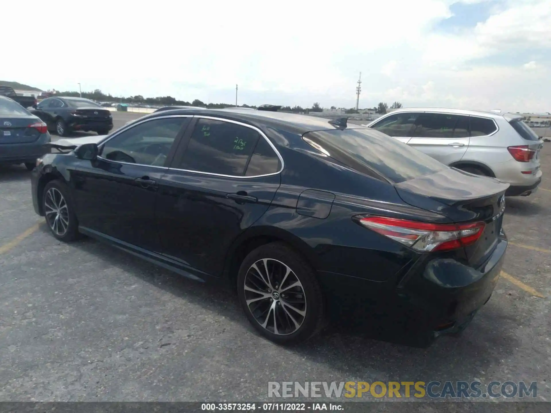 3 Photograph of a damaged car 4T1B11HK2KU701101 TOYOTA CAMRY 2019