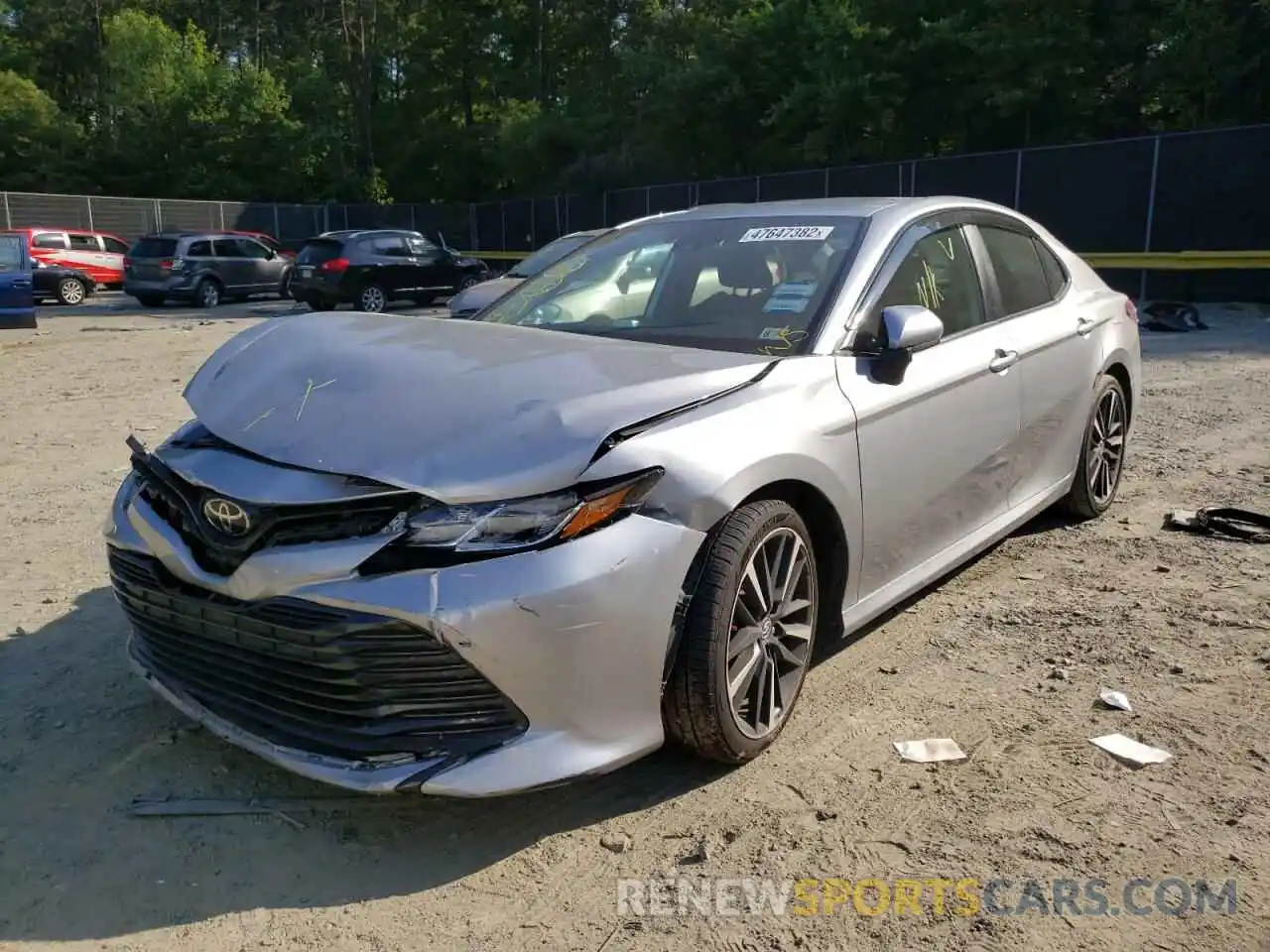 2 Photograph of a damaged car 4T1B11HK2KU702958 TOYOTA CAMRY 2019