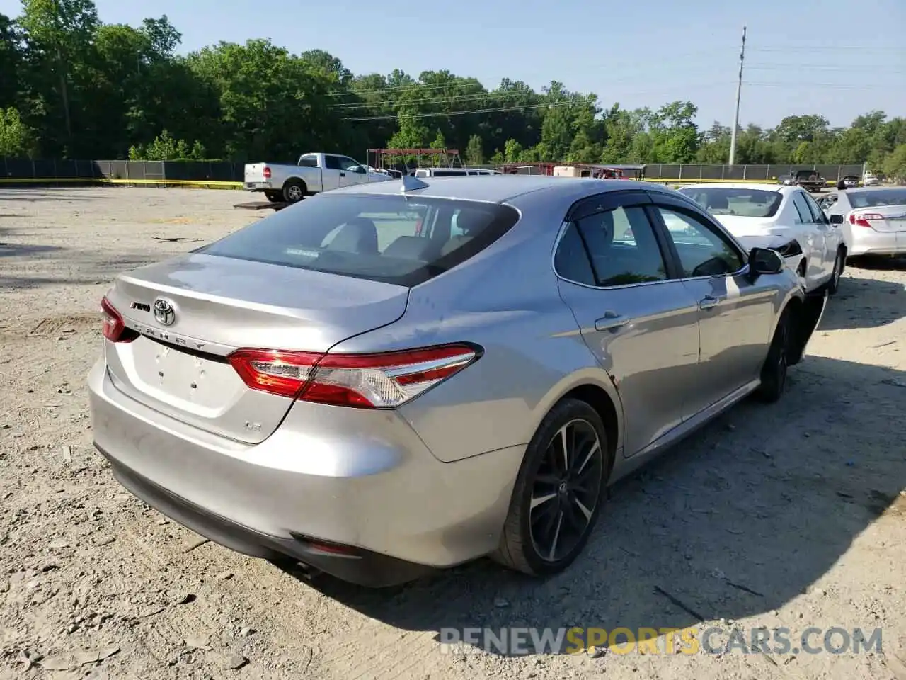 4 Photograph of a damaged car 4T1B11HK2KU702958 TOYOTA CAMRY 2019