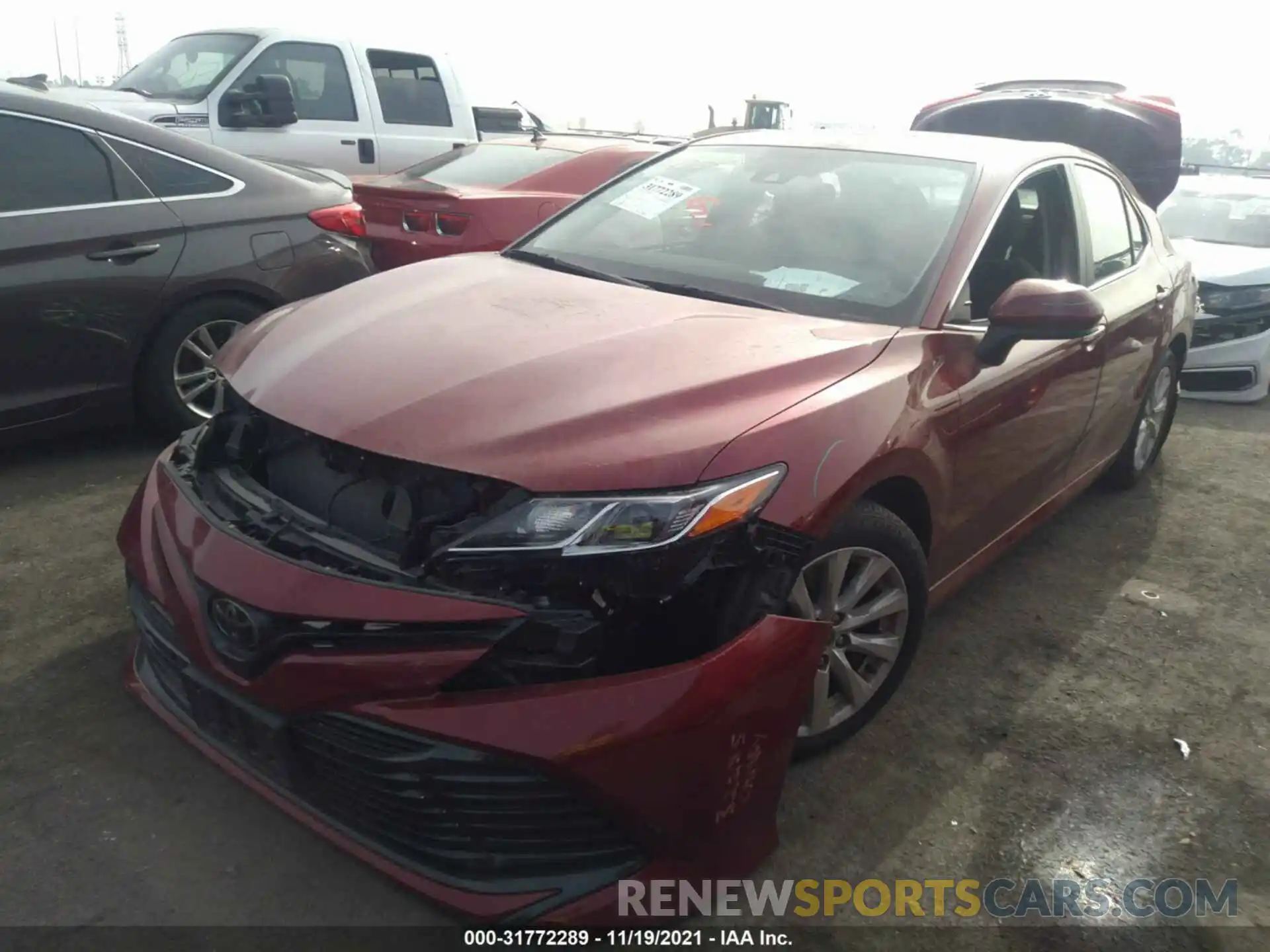 2 Photograph of a damaged car 4T1B11HK2KU704077 TOYOTA CAMRY 2019