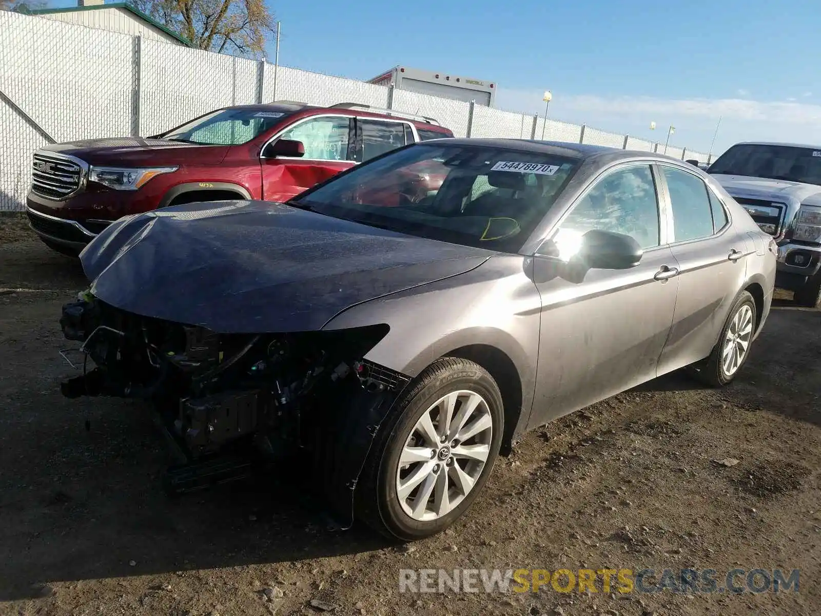 2 Photograph of a damaged car 4T1B11HK2KU704693 TOYOTA CAMRY 2019