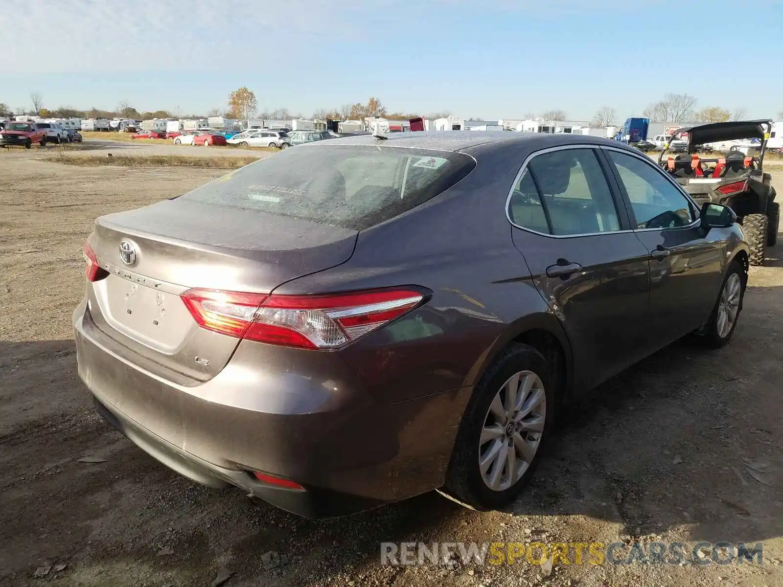 4 Photograph of a damaged car 4T1B11HK2KU704693 TOYOTA CAMRY 2019