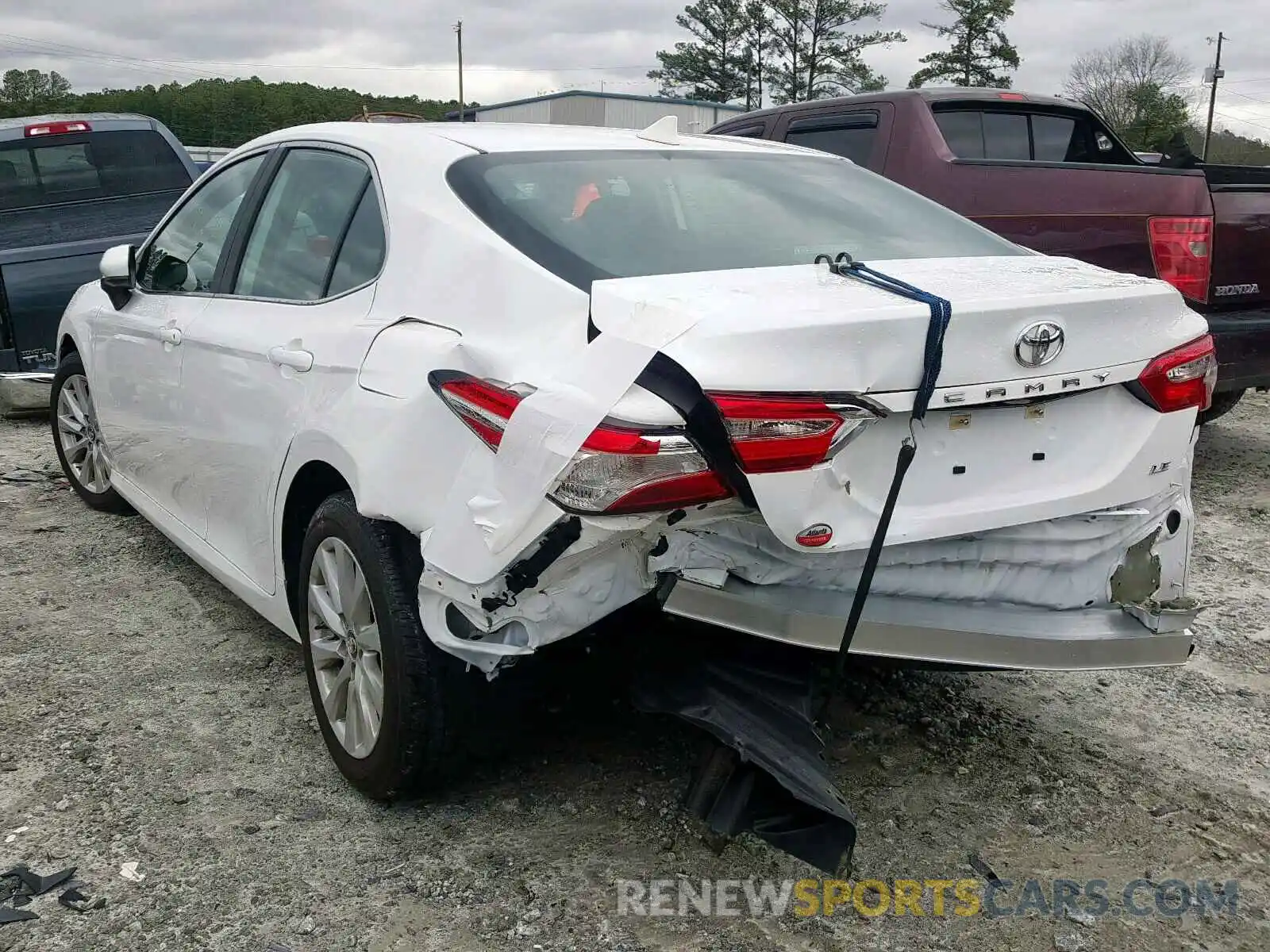 3 Photograph of a damaged car 4T1B11HK2KU705990 TOYOTA CAMRY 2019