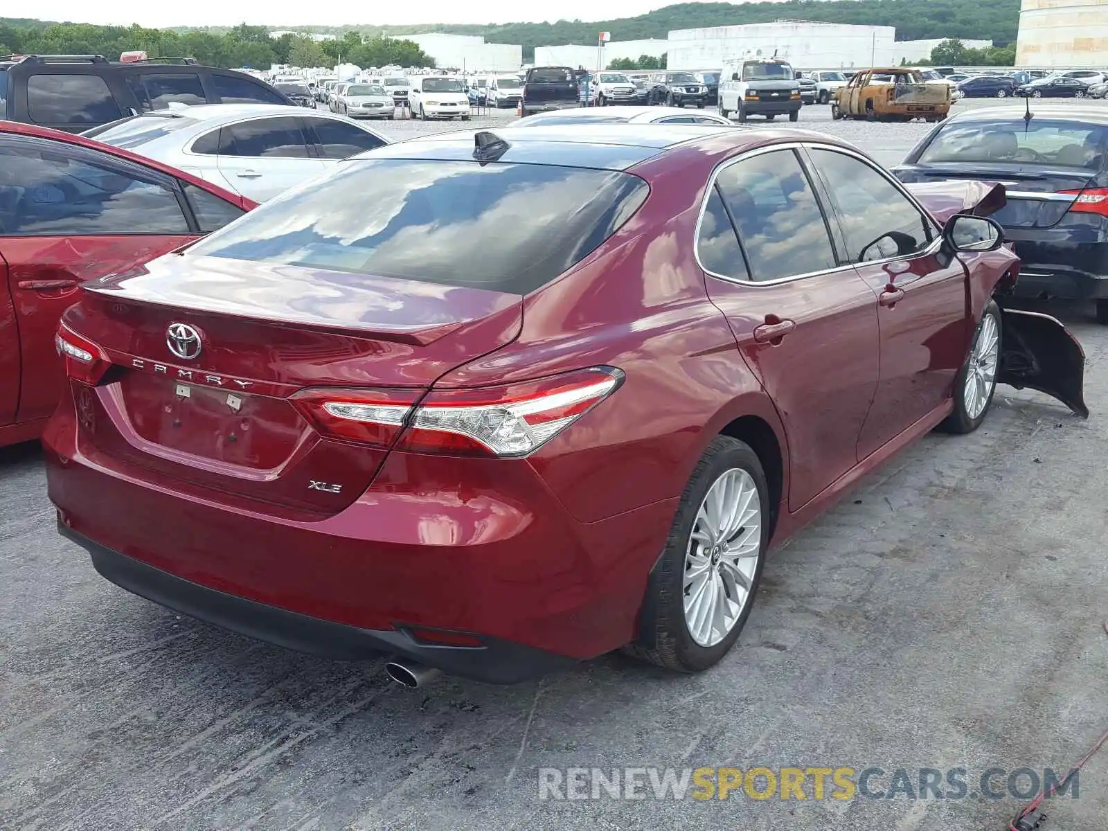 4 Photograph of a damaged car 4T1B11HK2KU706136 TOYOTA CAMRY 2019