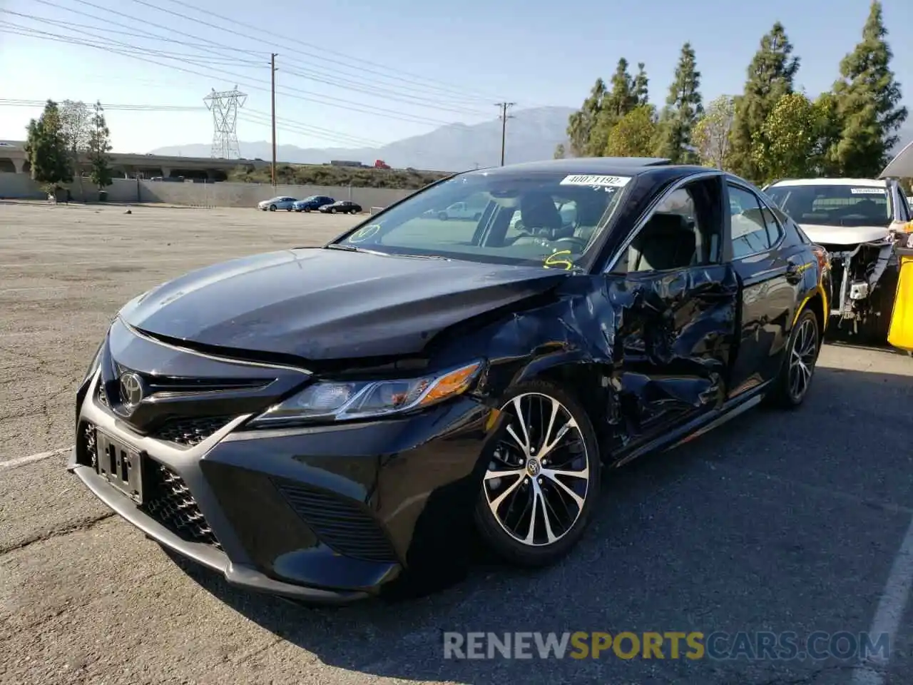 2 Photograph of a damaged car 4T1B11HK2KU706783 TOYOTA CAMRY 2019