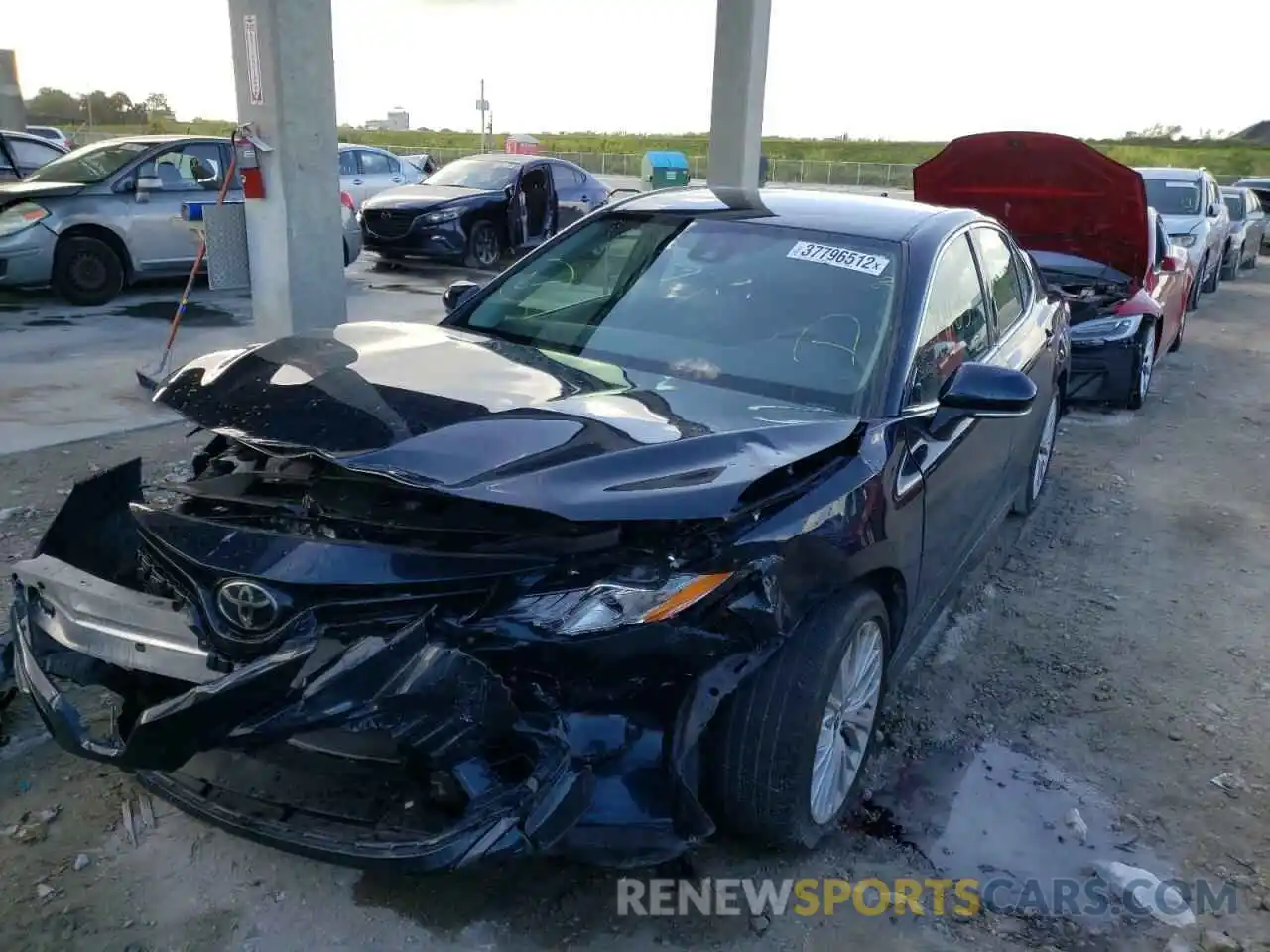 2 Photograph of a damaged car 4T1B11HK2KU707285 TOYOTA CAMRY 2019