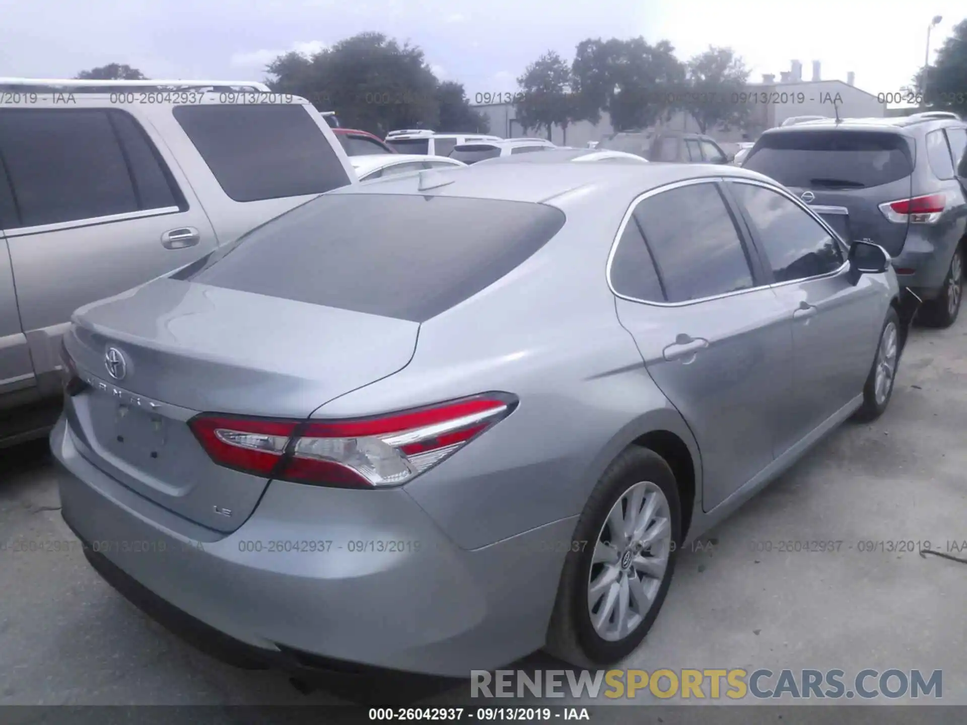 4 Photograph of a damaged car 4T1B11HK2KU709683 TOYOTA CAMRY 2019