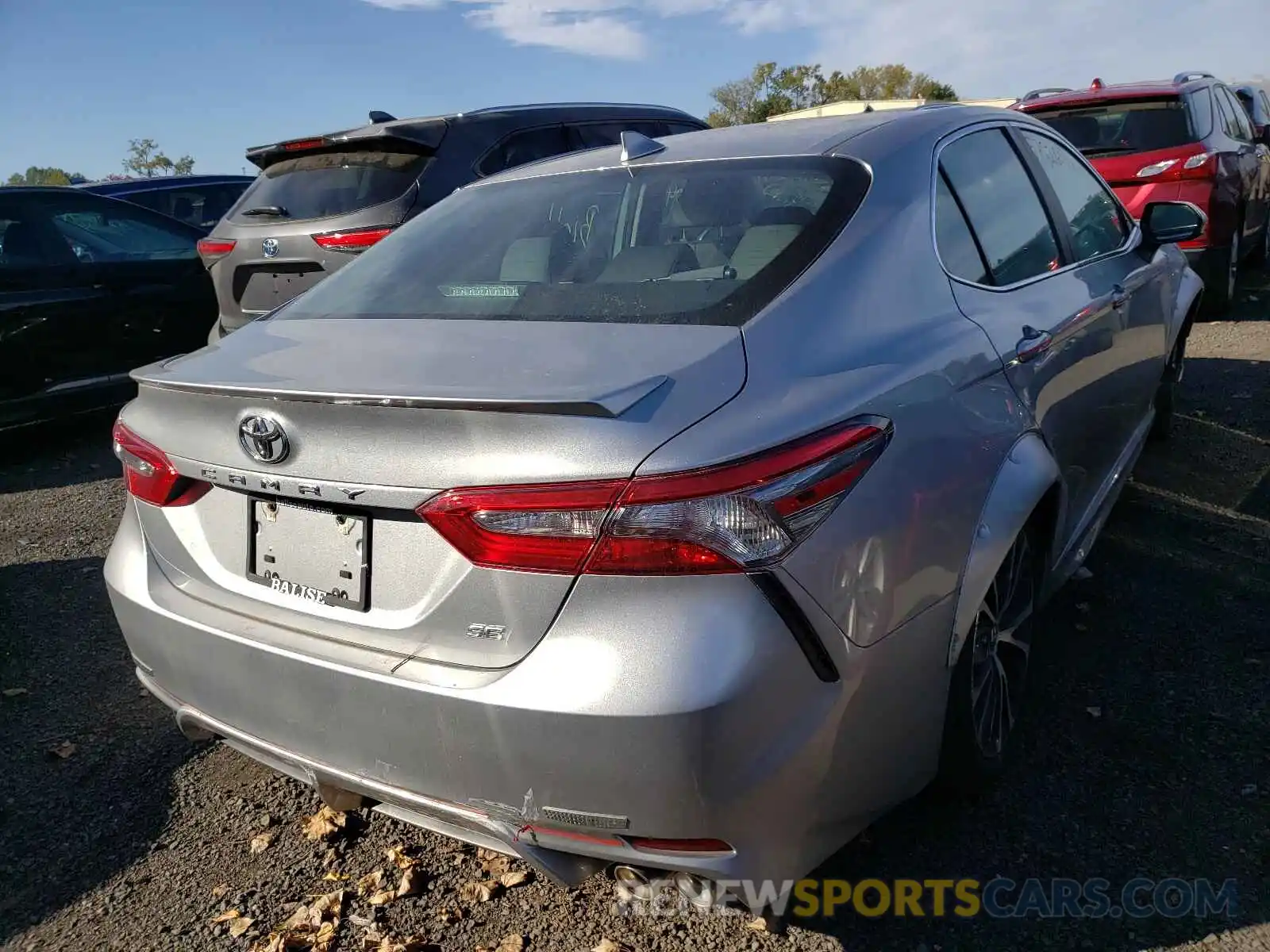 4 Photograph of a damaged car 4T1B11HK2KU710395 TOYOTA CAMRY 2019