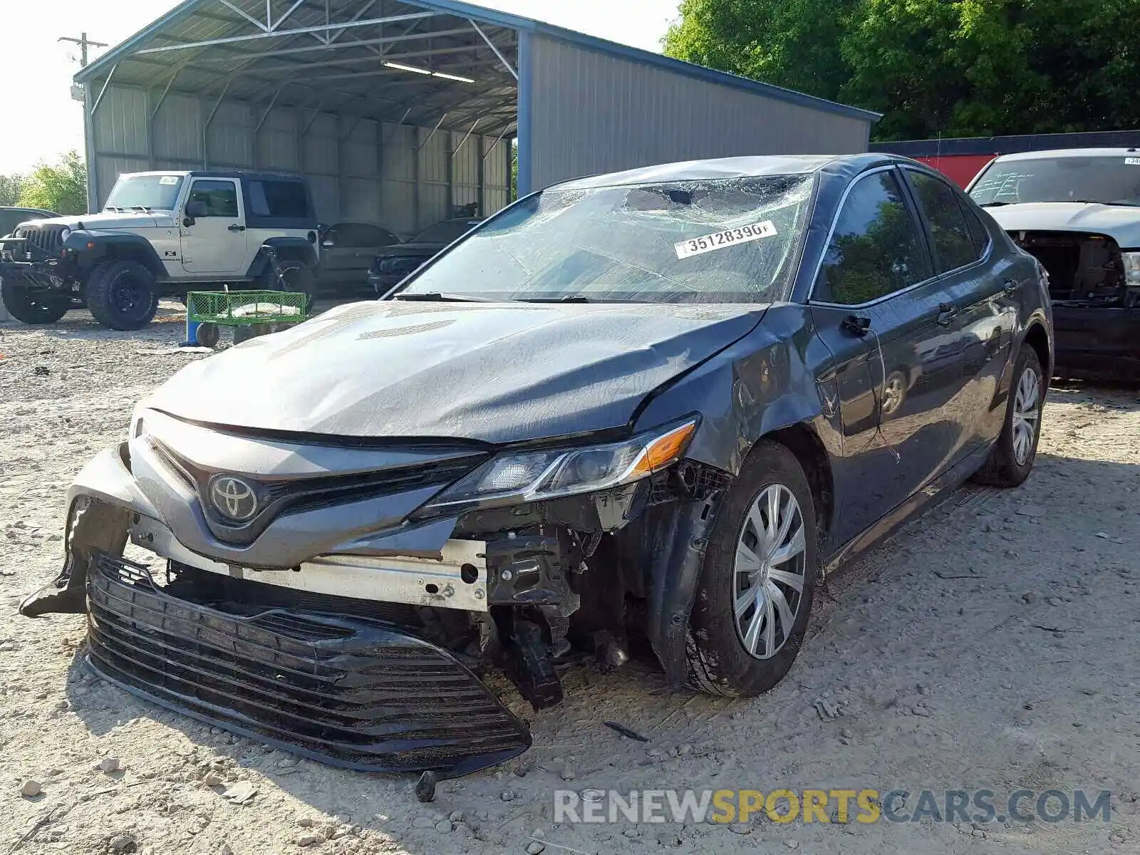 2 Photograph of a damaged car 4T1B11HK2KU712132 TOYOTA CAMRY 2019