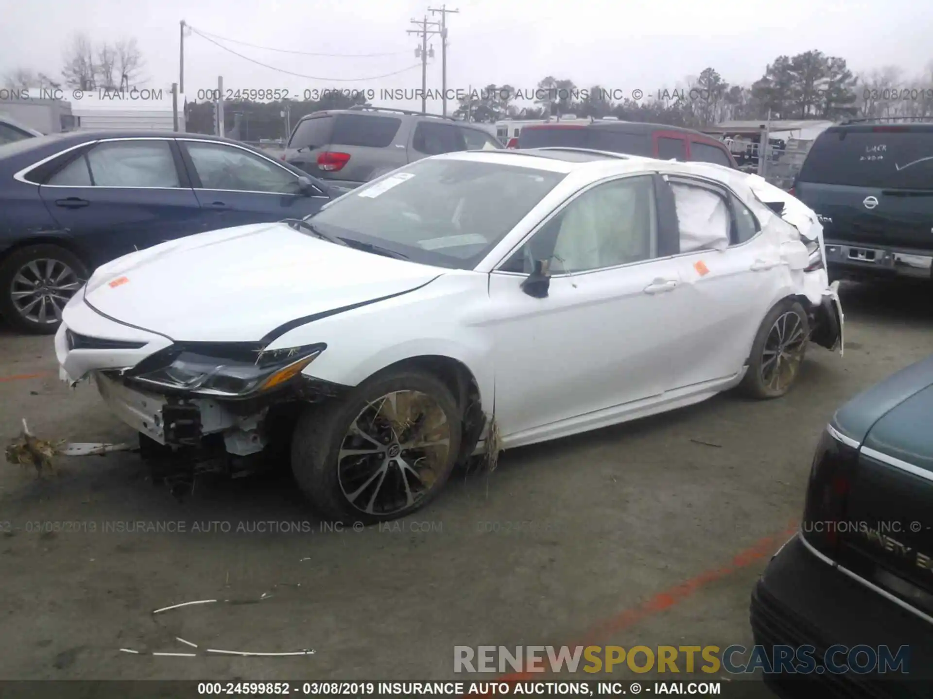 2 Photograph of a damaged car 4T1B11HK2KU712163 TOYOTA CAMRY 2019