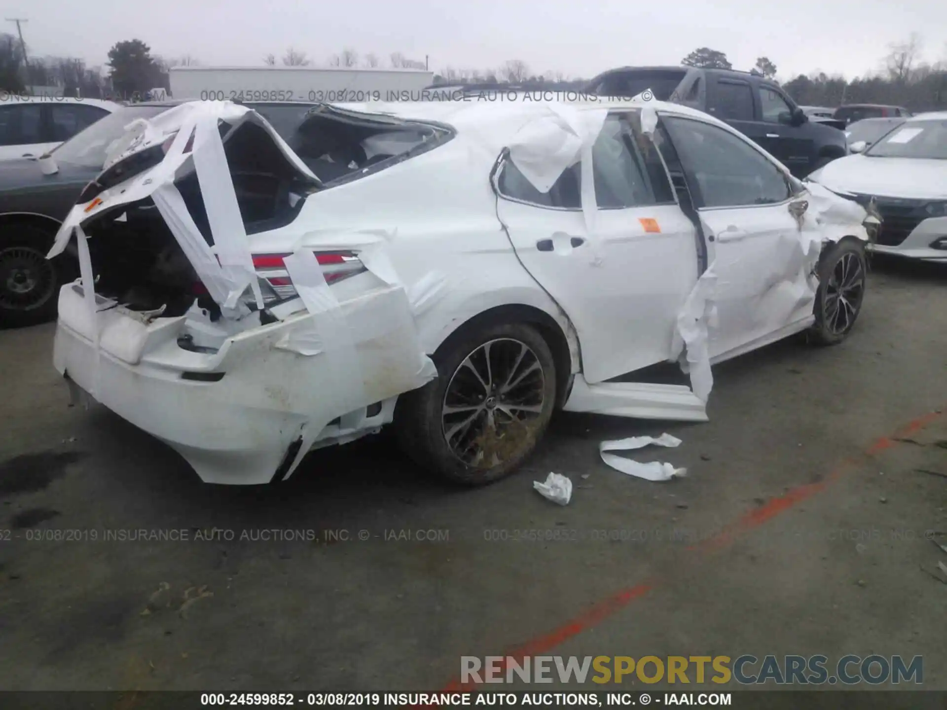 4 Photograph of a damaged car 4T1B11HK2KU712163 TOYOTA CAMRY 2019