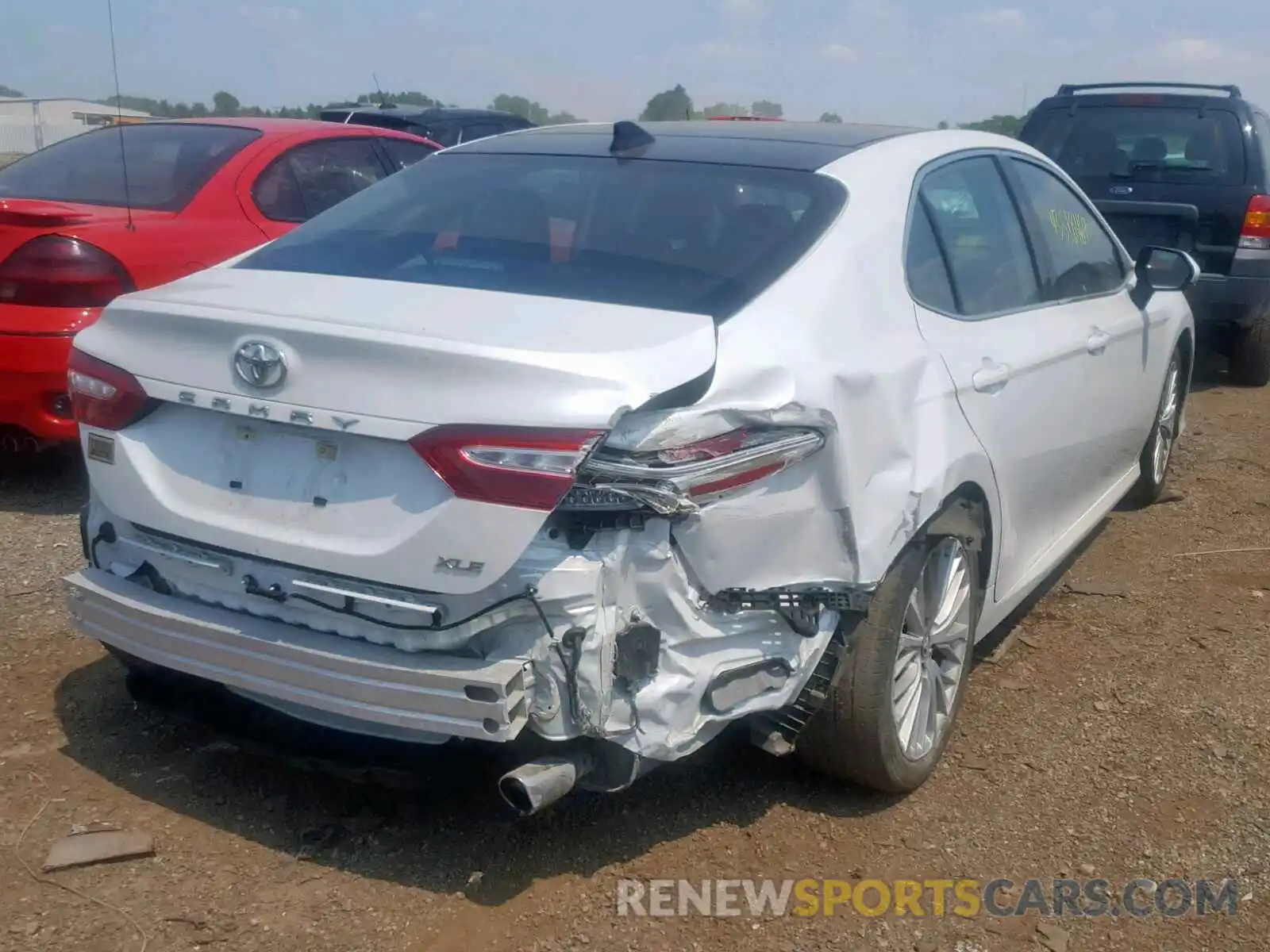 4 Photograph of a damaged car 4T1B11HK2KU713197 TOYOTA CAMRY 2019