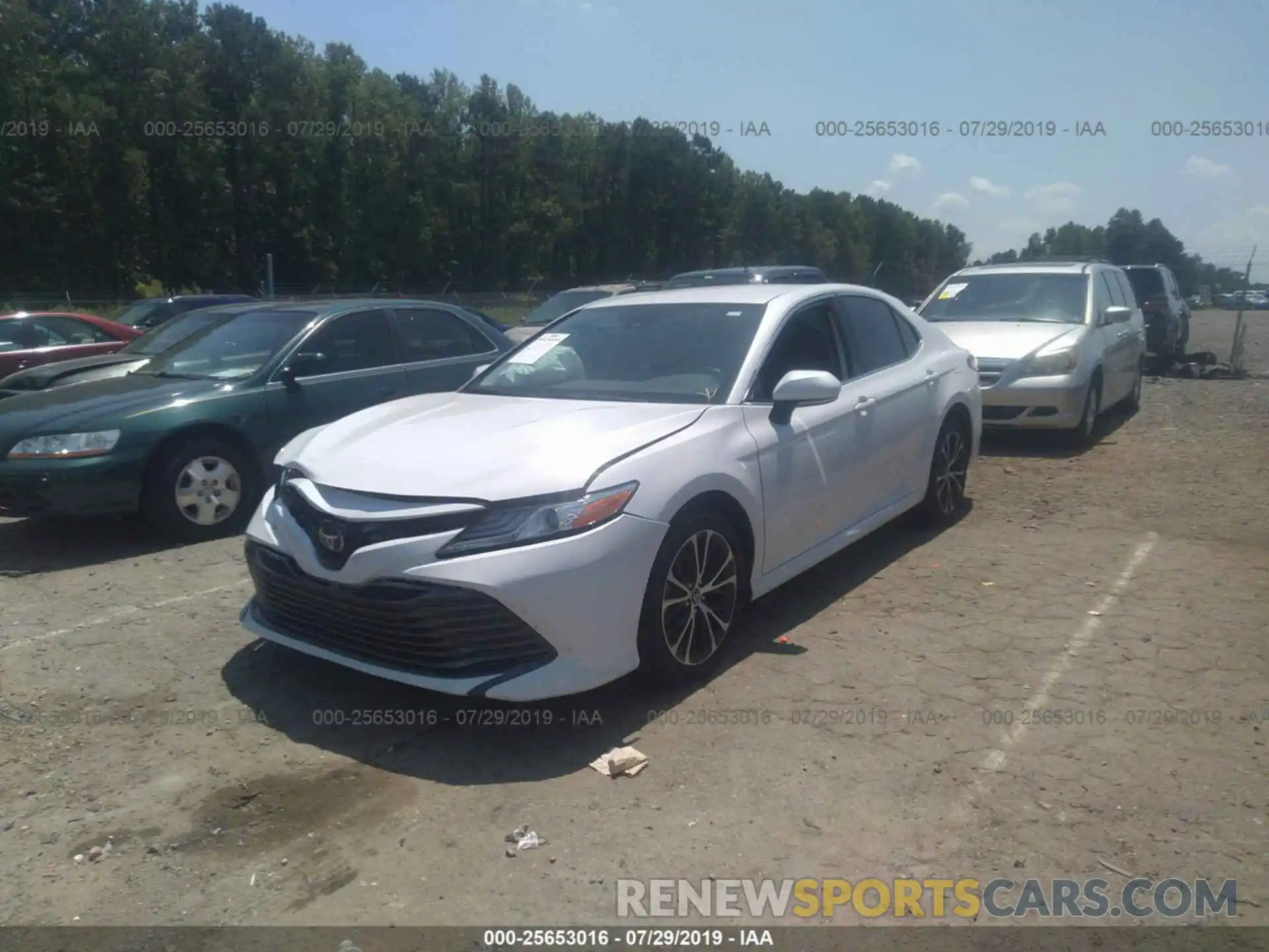 2 Photograph of a damaged car 4T1B11HK2KU713880 TOYOTA CAMRY 2019