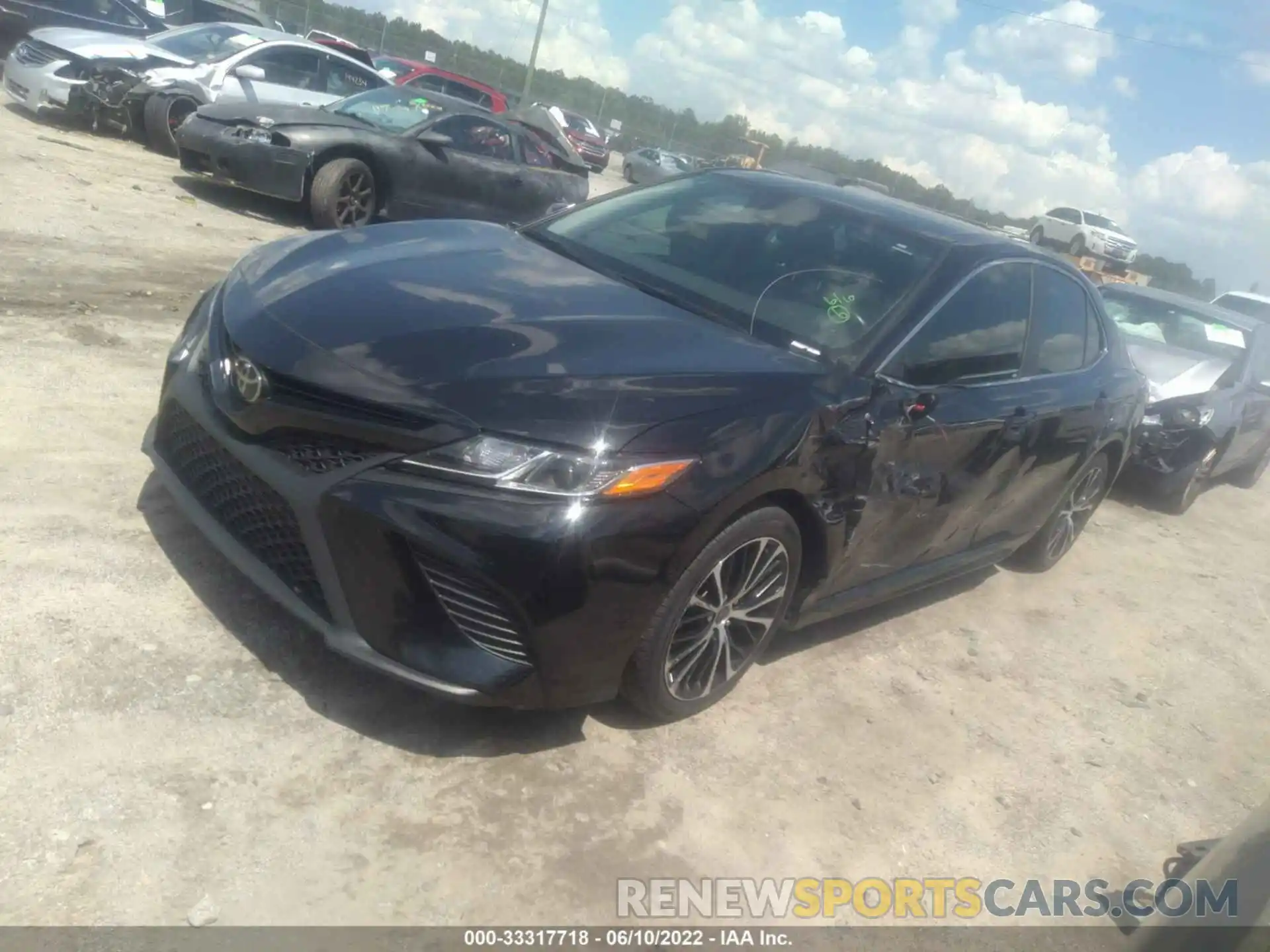 2 Photograph of a damaged car 4T1B11HK2KU714415 TOYOTA CAMRY 2019