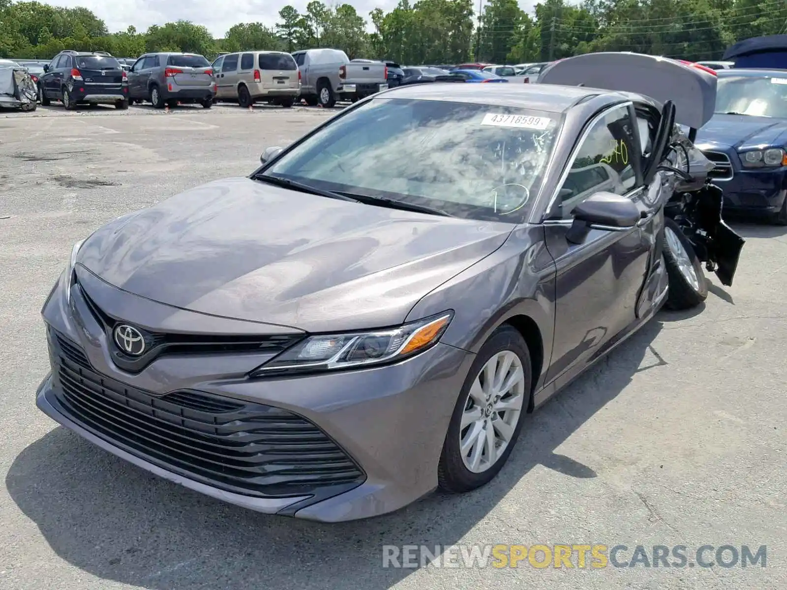 2 Photograph of a damaged car 4T1B11HK2KU715175 TOYOTA CAMRY 2019