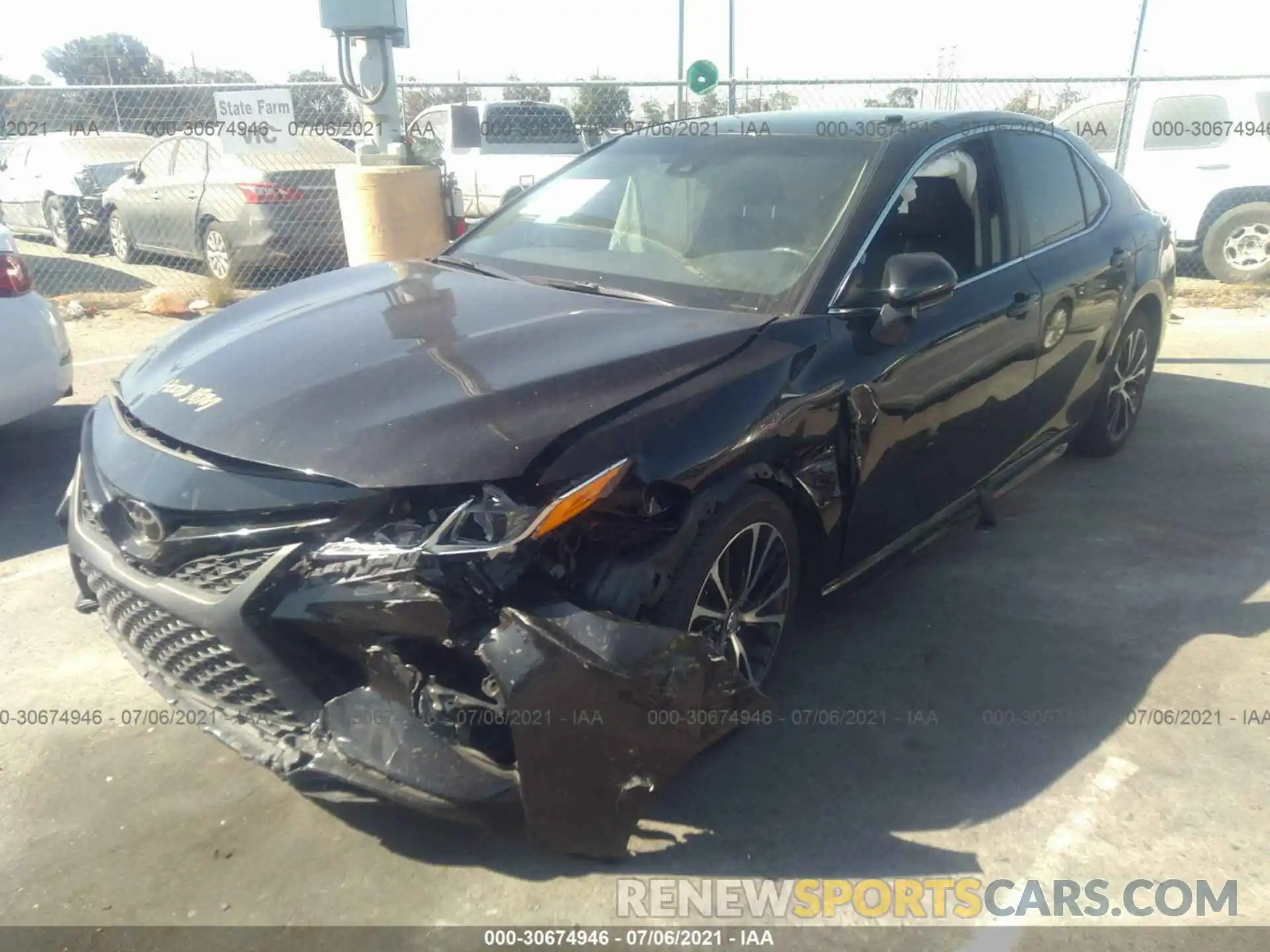 2 Photograph of a damaged car 4T1B11HK2KU715399 TOYOTA CAMRY 2019