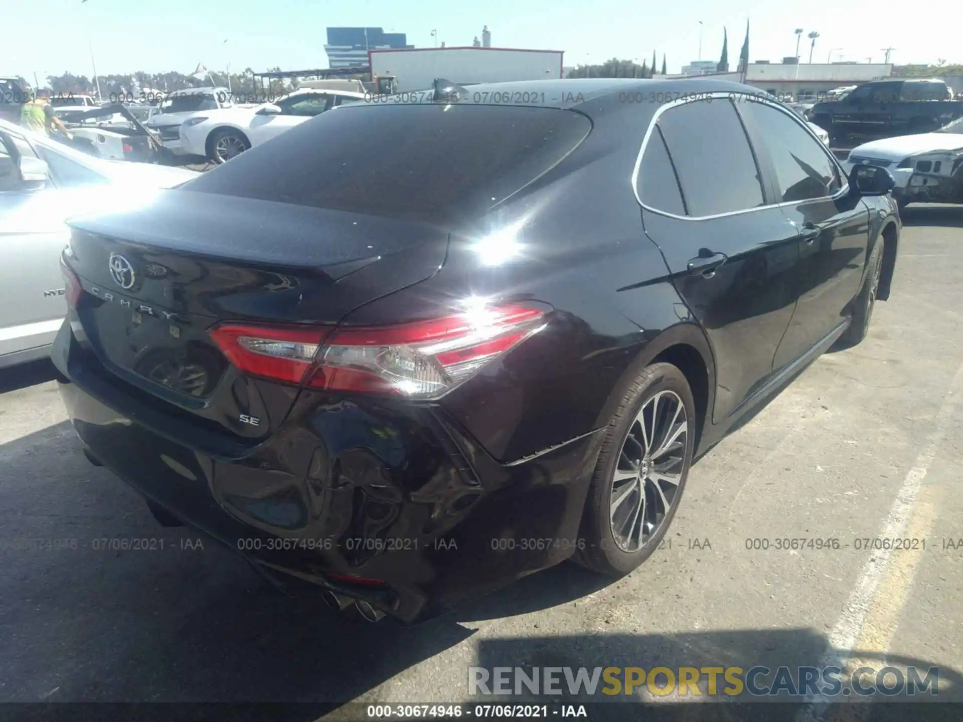 4 Photograph of a damaged car 4T1B11HK2KU715399 TOYOTA CAMRY 2019