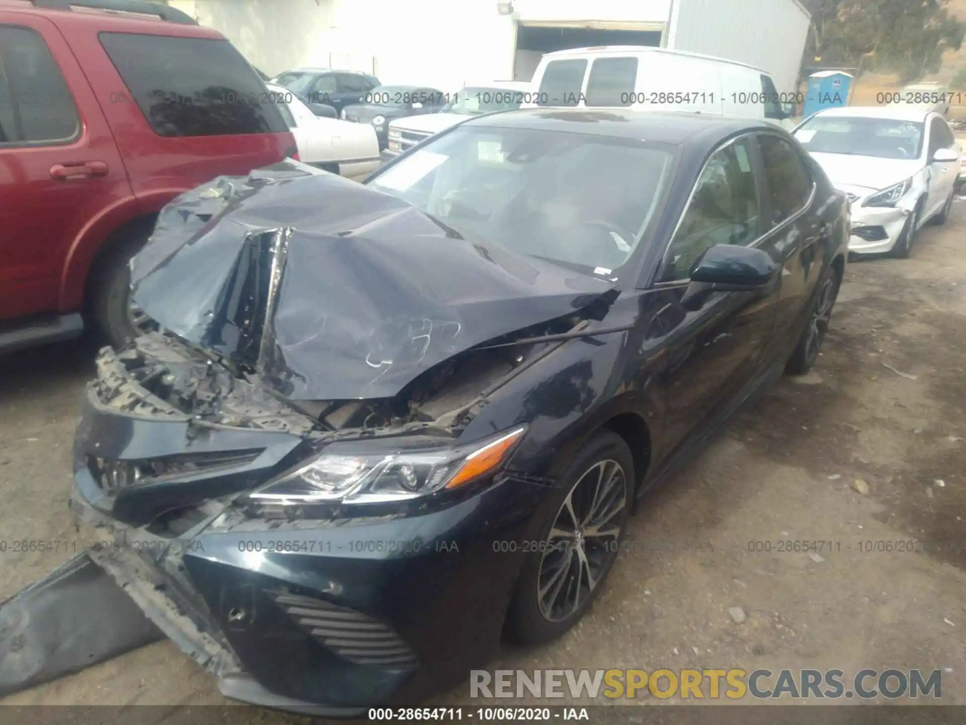 2 Photograph of a damaged car 4T1B11HK2KU718612 TOYOTA CAMRY 2019