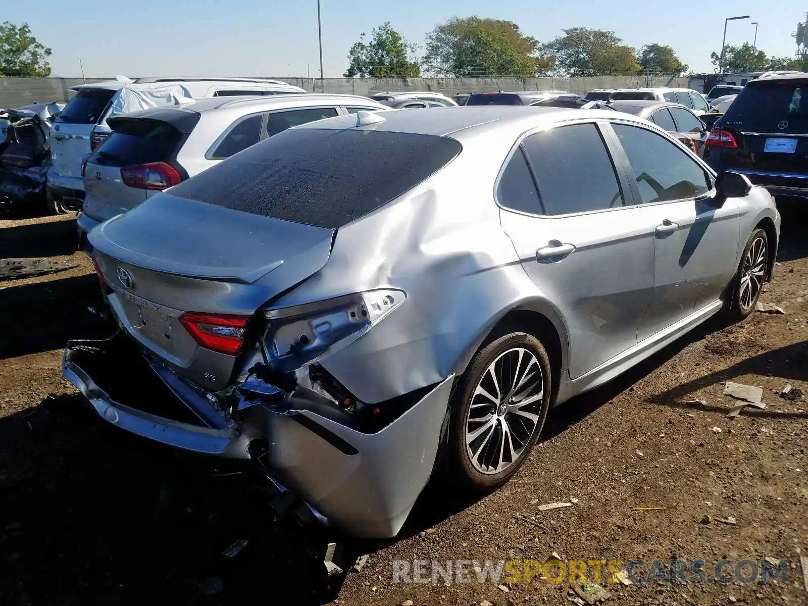 4 Photograph of a damaged car 4T1B11HK2KU718965 TOYOTA CAMRY 2019