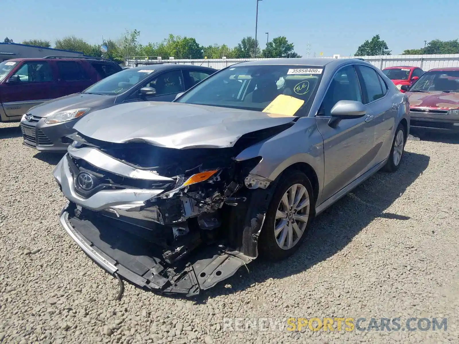 2 Photograph of a damaged car 4T1B11HK2KU719274 TOYOTA CAMRY 2019