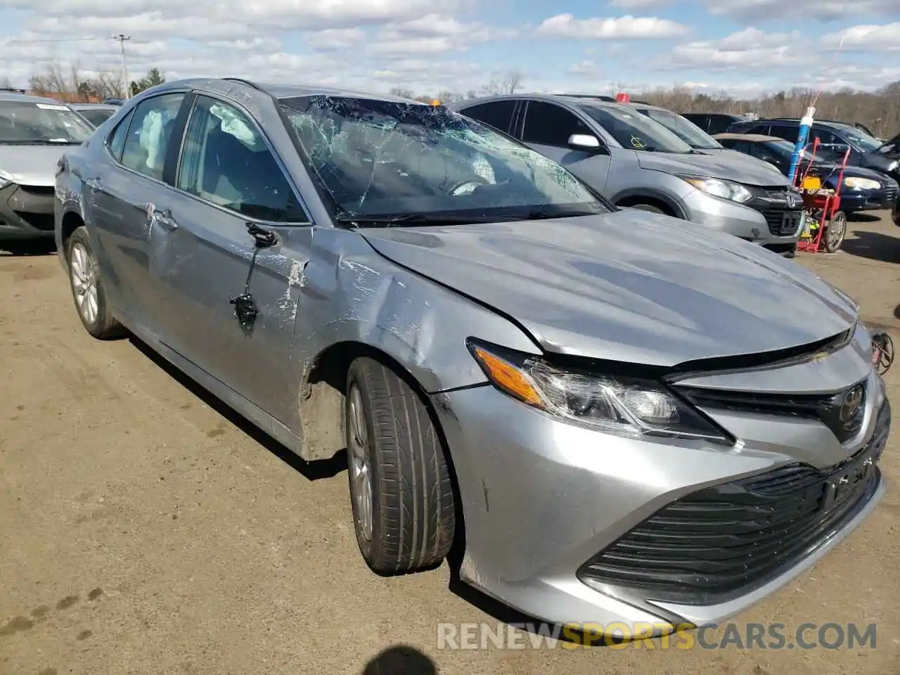 4 Photograph of a damaged car 4T1B11HK2KU721512 TOYOTA CAMRY 2019