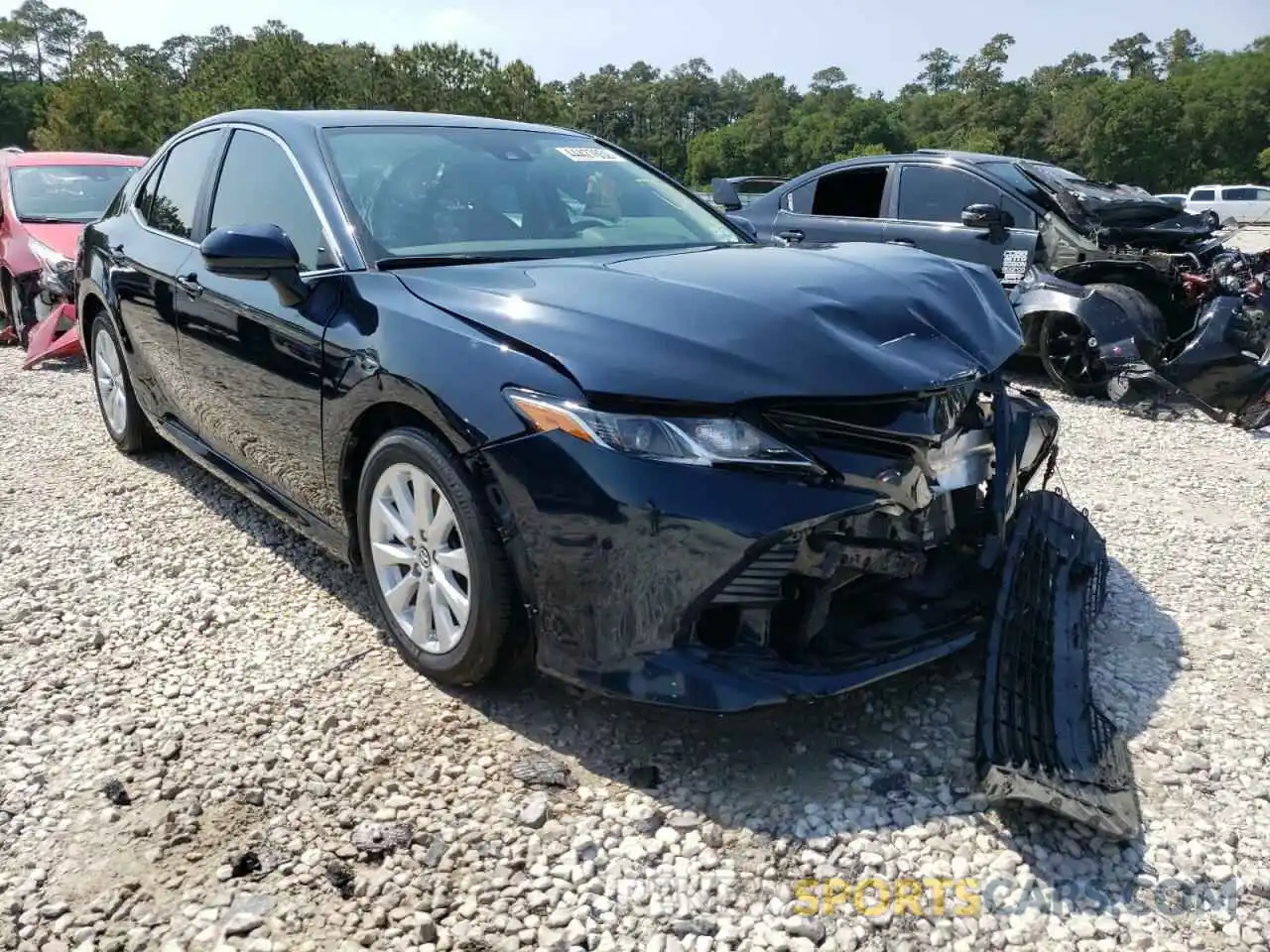 1 Photograph of a damaged car 4T1B11HK2KU721820 TOYOTA CAMRY 2019